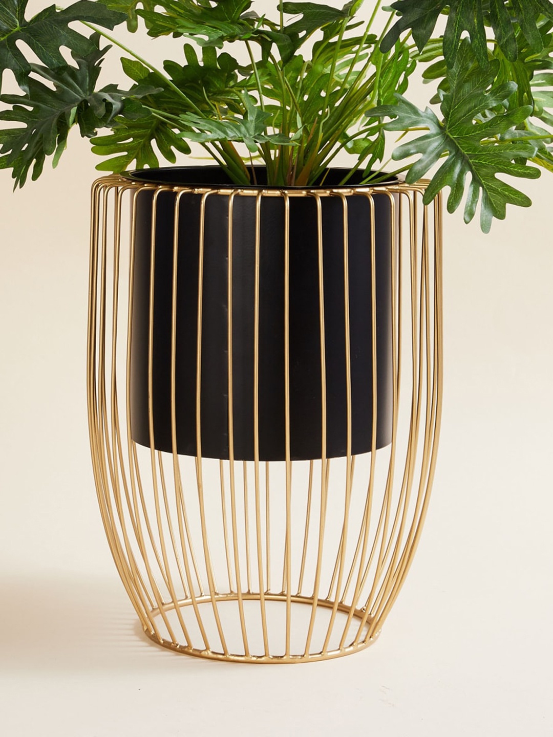 

Home Centre Gold-Toned & Black Solid Iron Planter With Stand, Multi