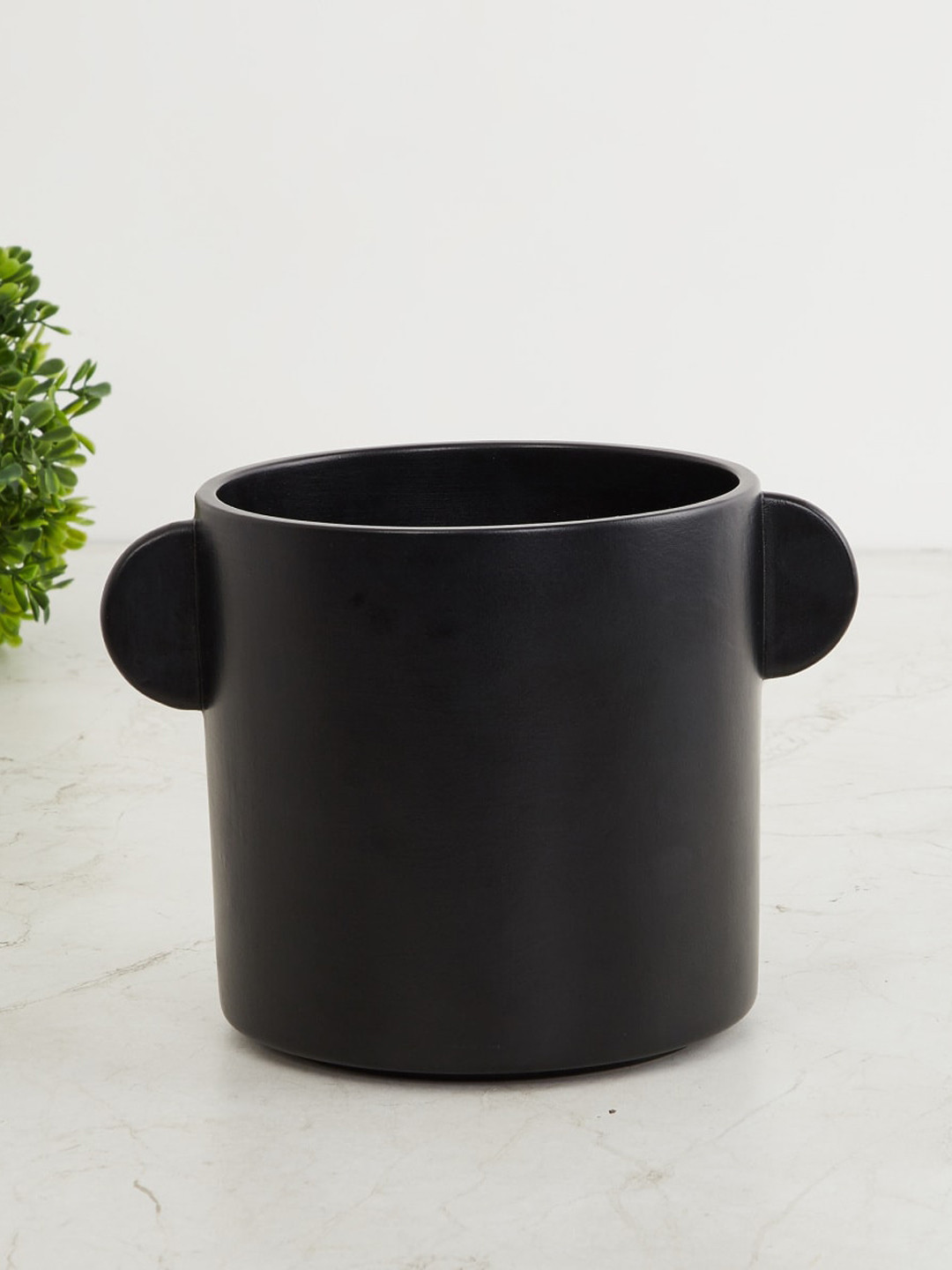 

Home Centre Black Solid Splendid Ceramic Ear Planter
