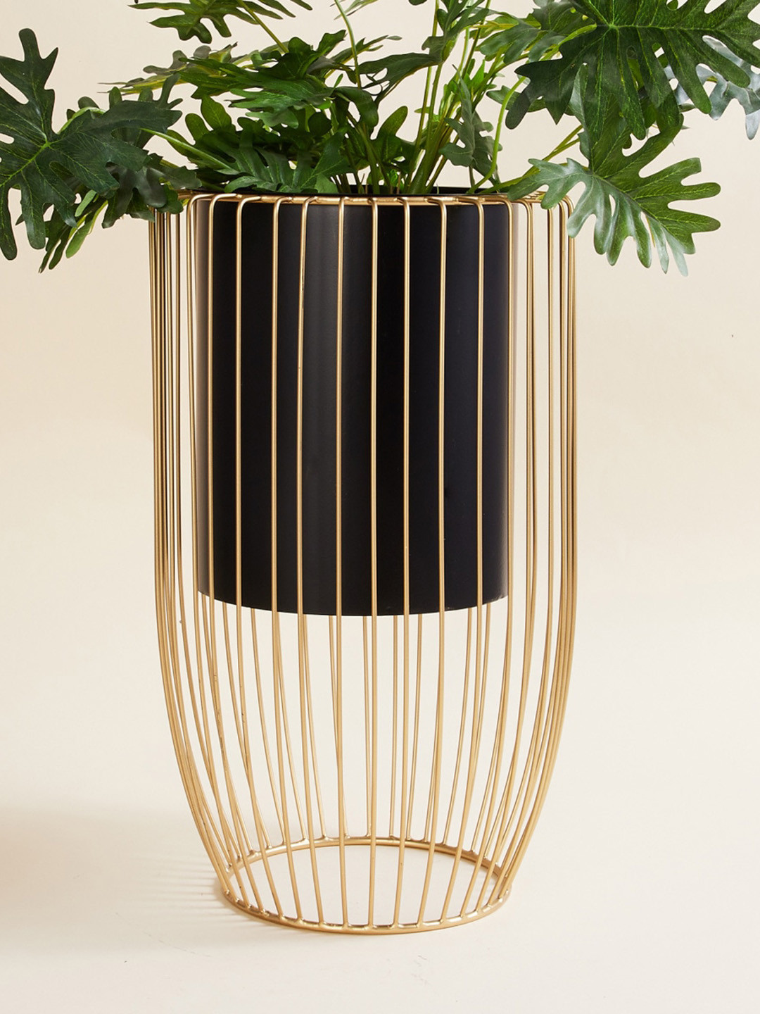 

Home Centre Black & Gold-Toned Solid Metal Planter With Stand