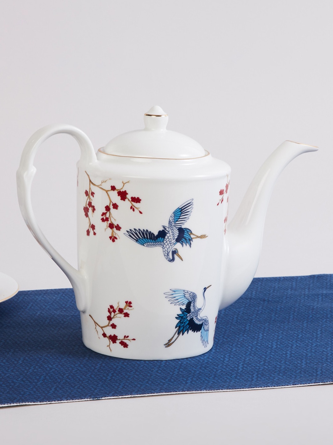 

Home Centre White Printed Bone China Tea Pot