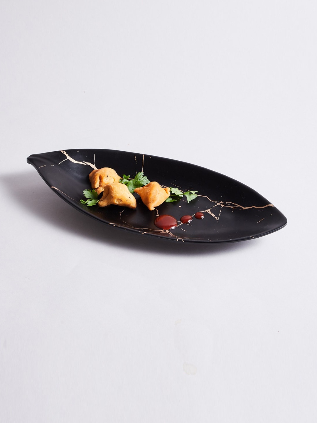 

Home Centre Black Printed Bay Leaf Platter