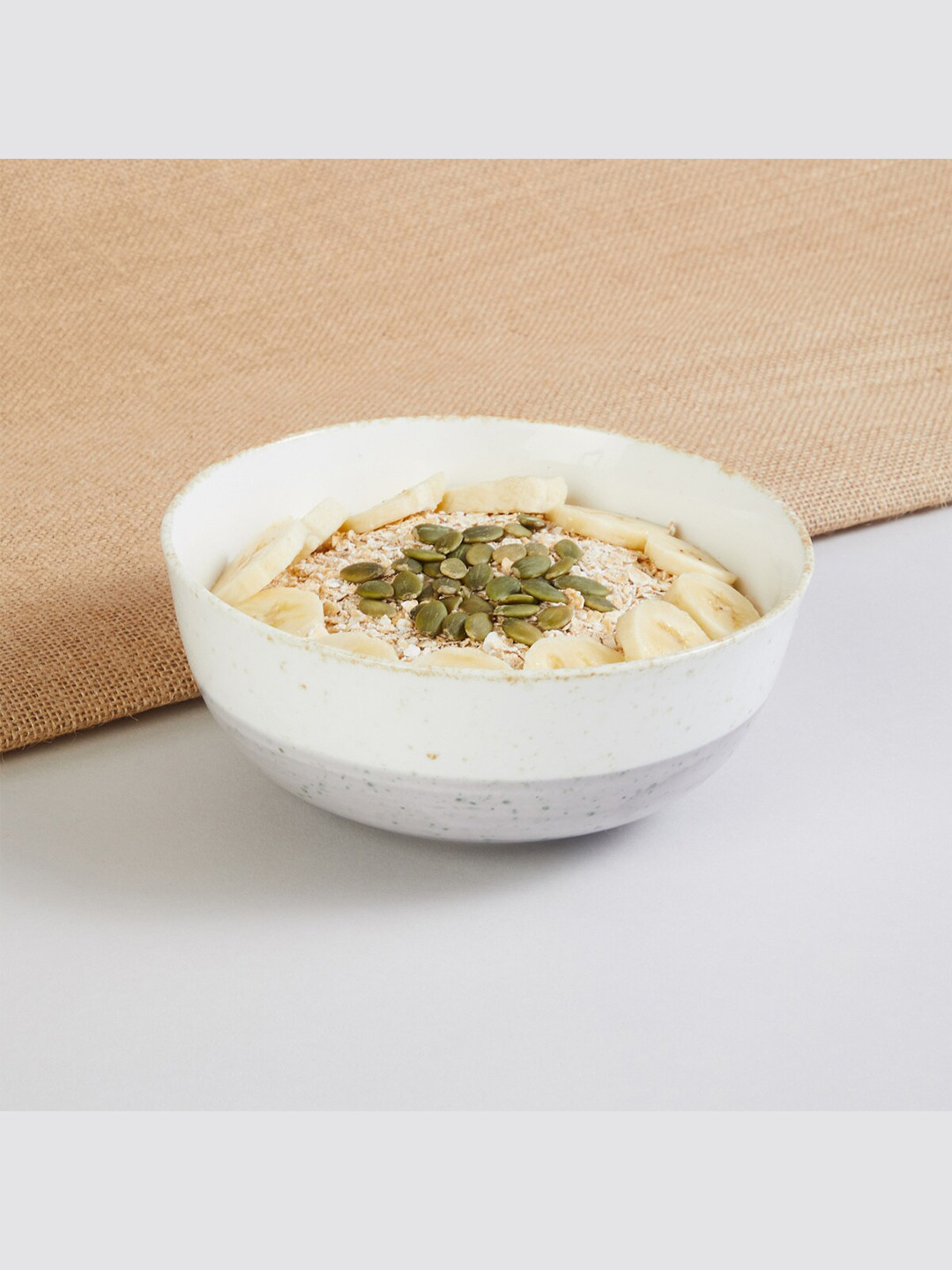 

Home Centre White & Grey 1 Pieces Bone China Glossy Bowls