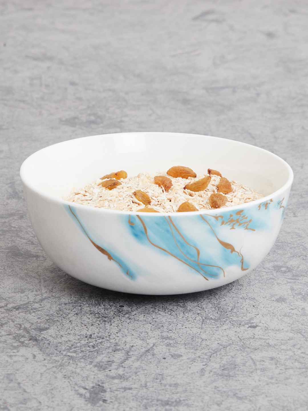 

Home Centre Teal & White 1 Pieces Printed Bone China Glossy Bowls