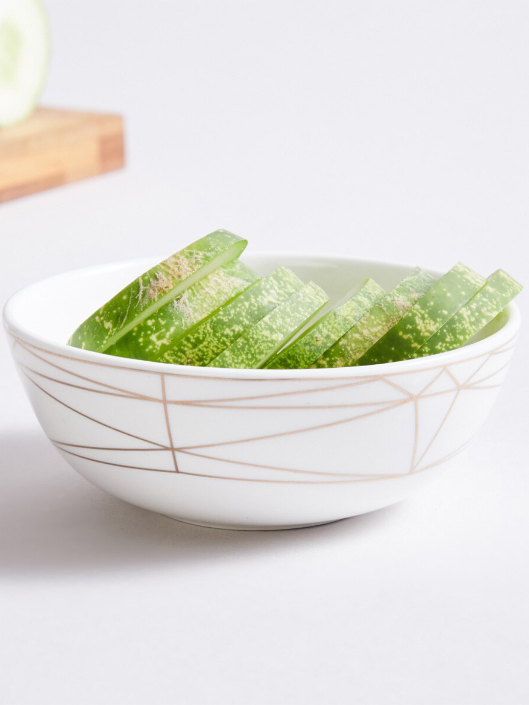 

Home Centre Off White & Beige 1 Pieces Geometric Printed Bone China Glossy Bowls