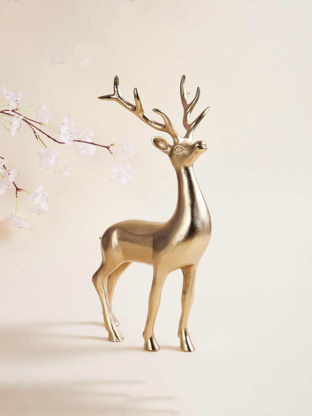 

Home Centre Gold-Toned Solid Reindeer Showpiece