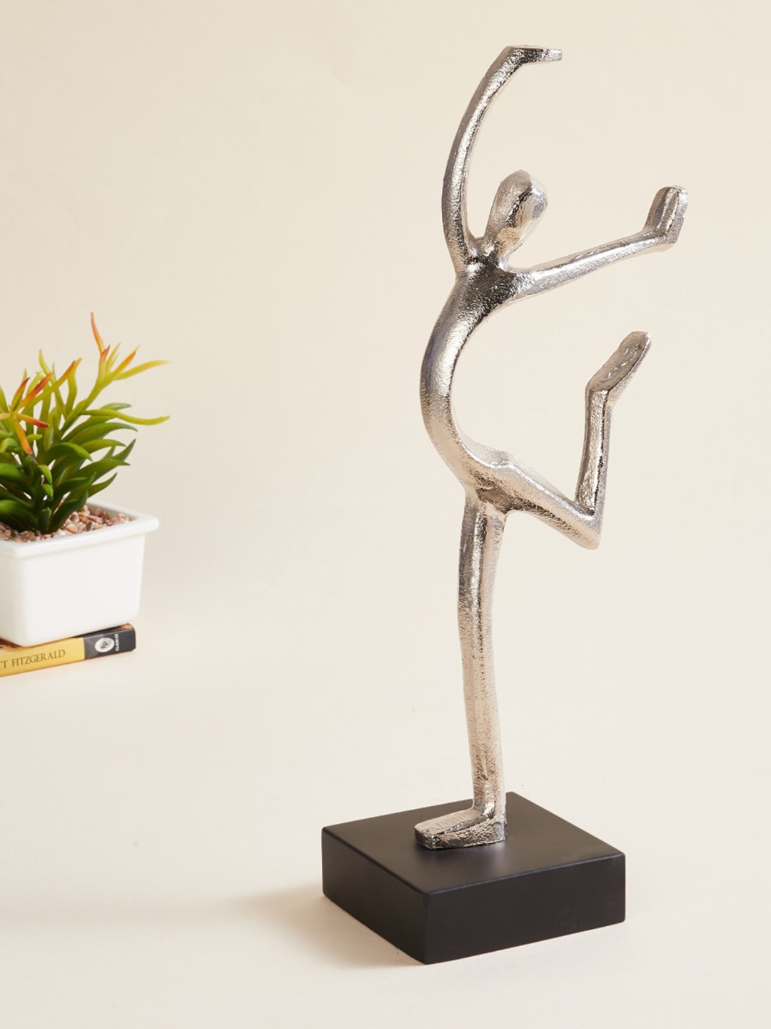

Home Centre Silver-Toned Solid Single-Leg Dancing Showpiece