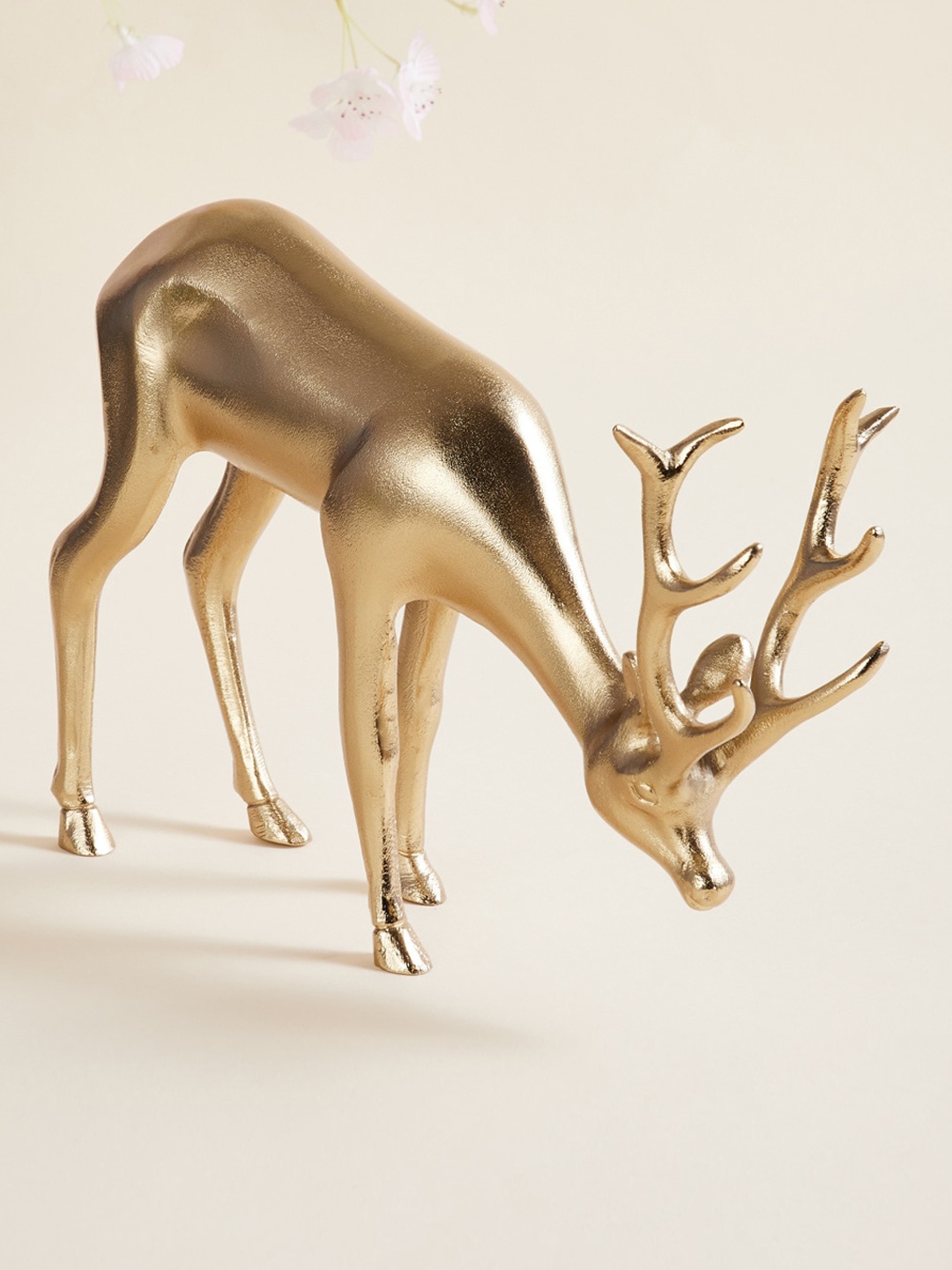 

Home Centre Gold-Toned Solid Polyresin Decorative Reindeer Figurine