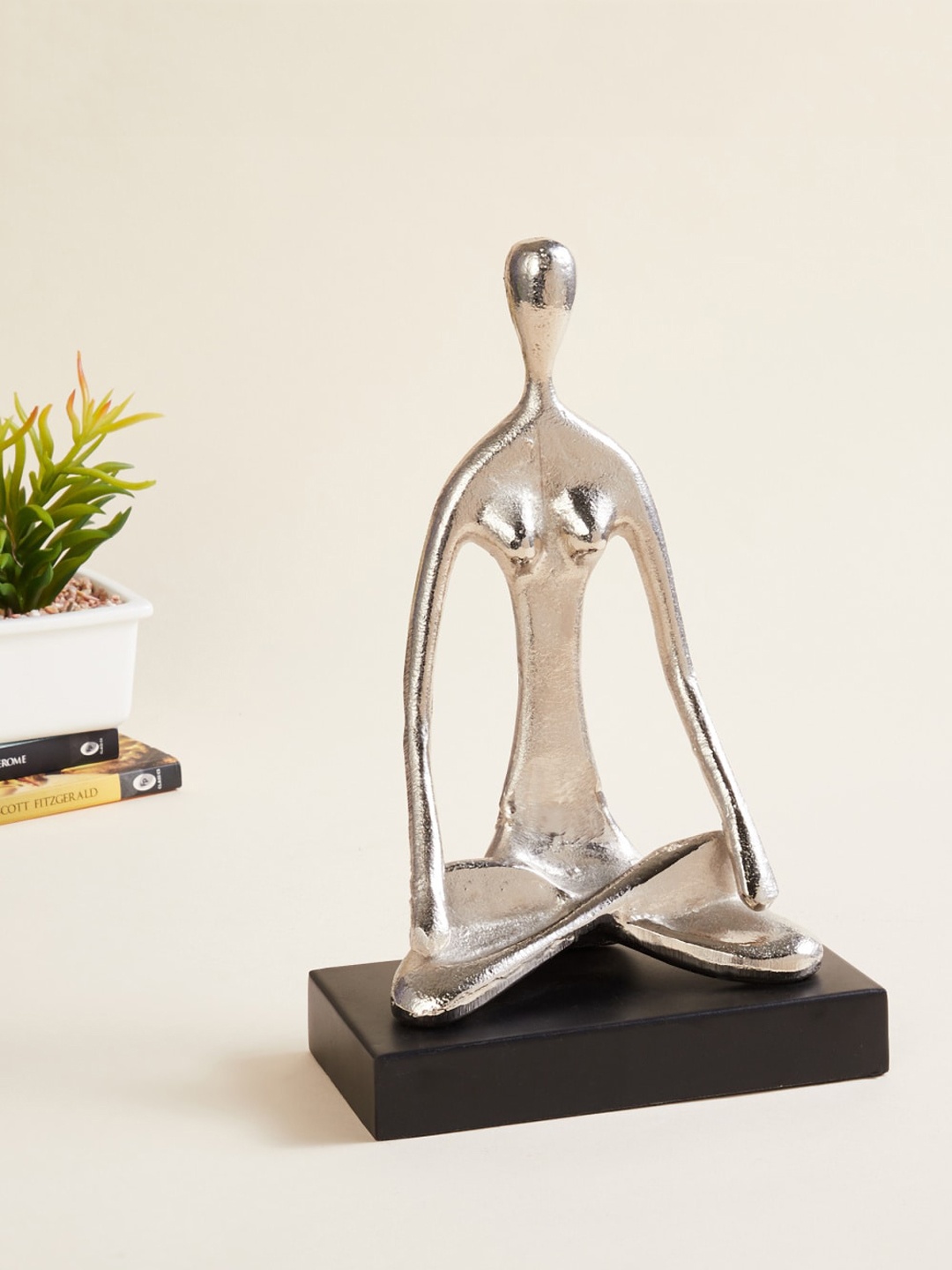 

Home Centre Silver-Toned & Black Solid Padmasana Yoga Figurine Metal Showpieces