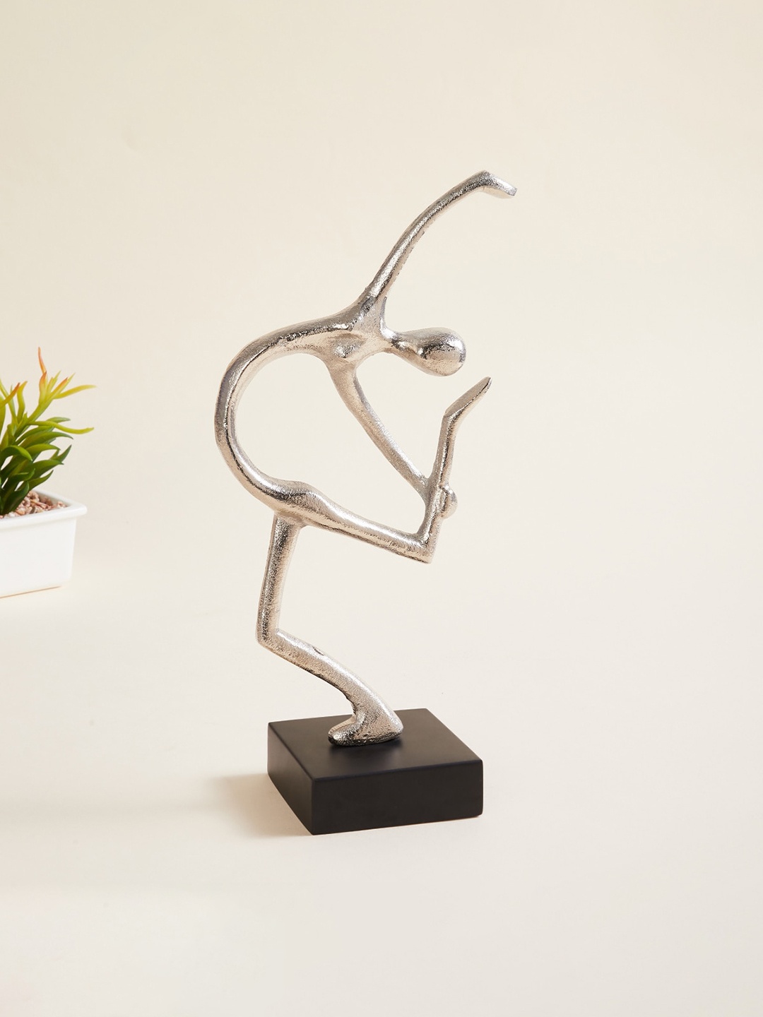 

Home Centre Silver-Colored Solid Metal Dancing Figurine Showpiece
