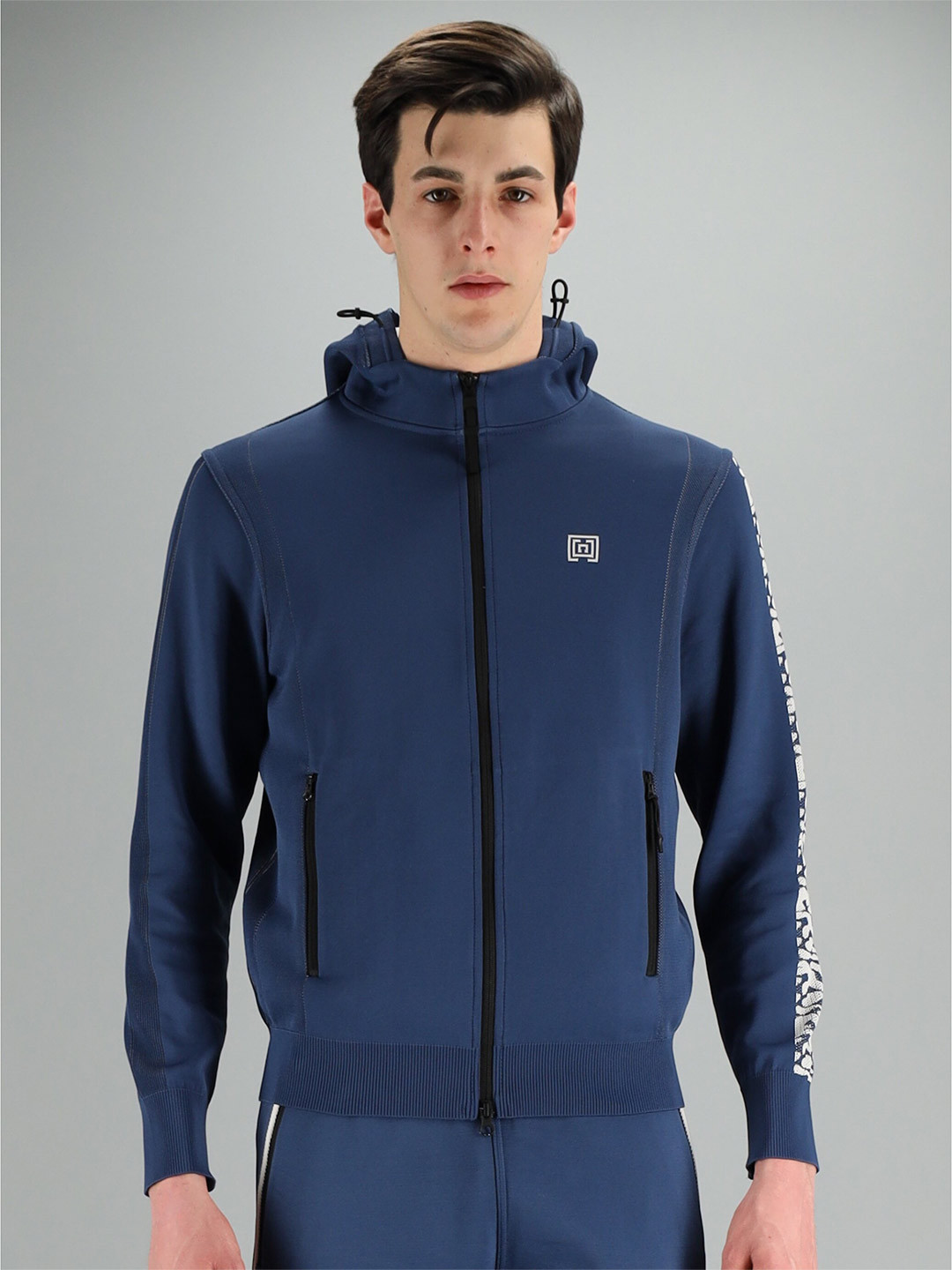 

FREESOUL Men Blue Solid Hooded Sweatshirt