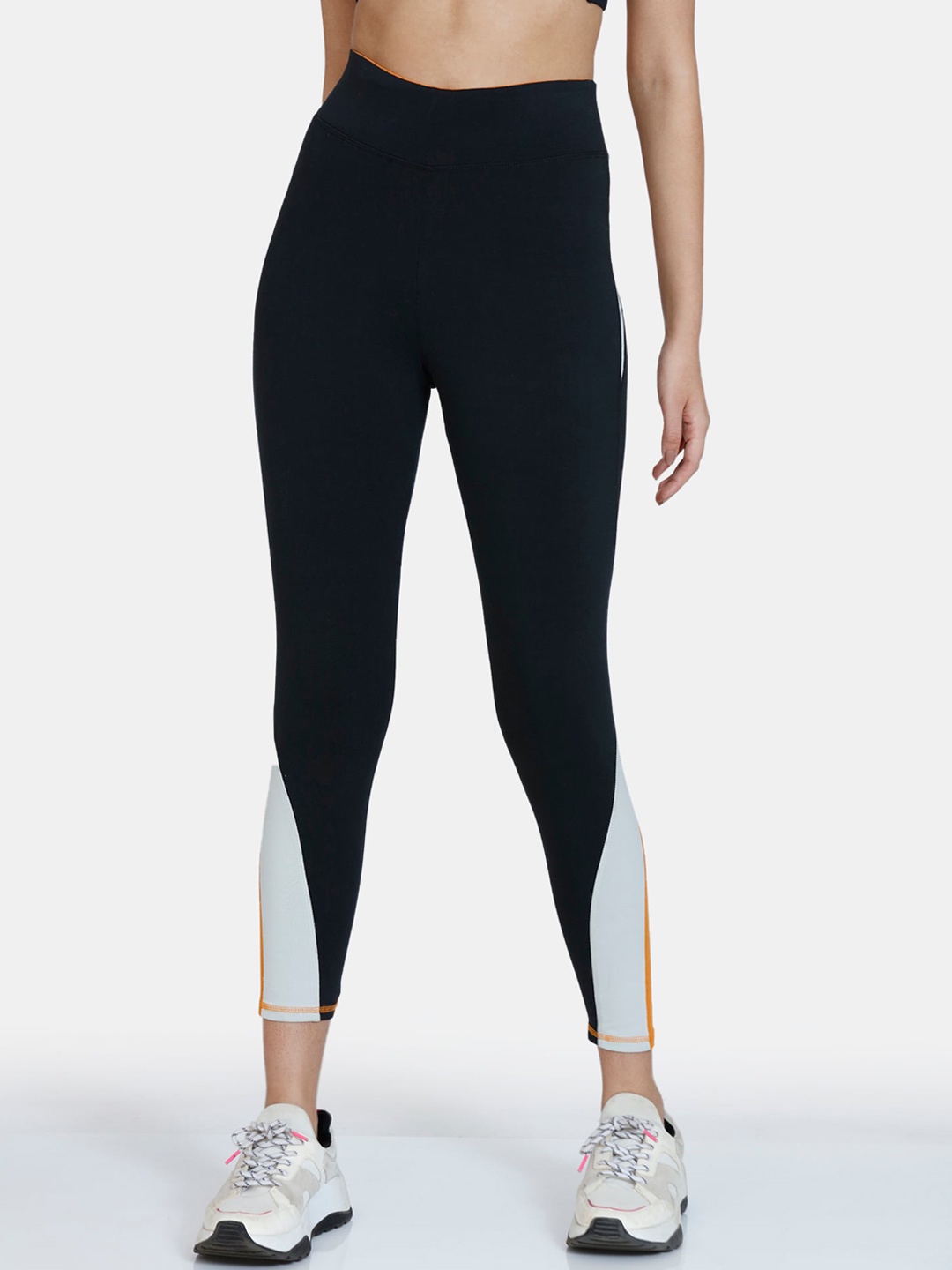 

Zelocity by Zivame Women Black & Orange Colourblocked Ankle Length Training Tights