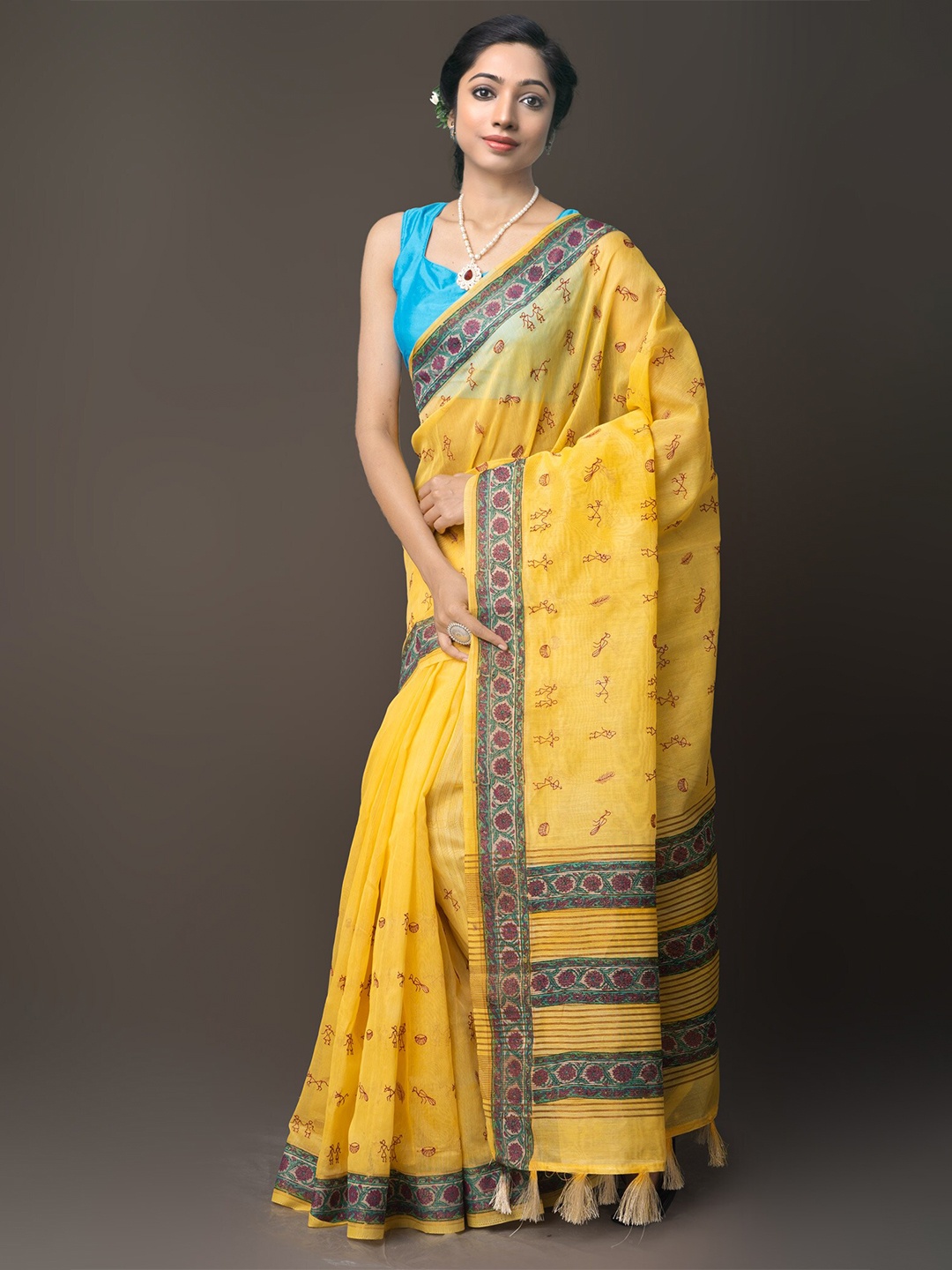 

Unnati Silks Yellow & Green Warli Embroidered Silk Cotton Banarasi Saree
