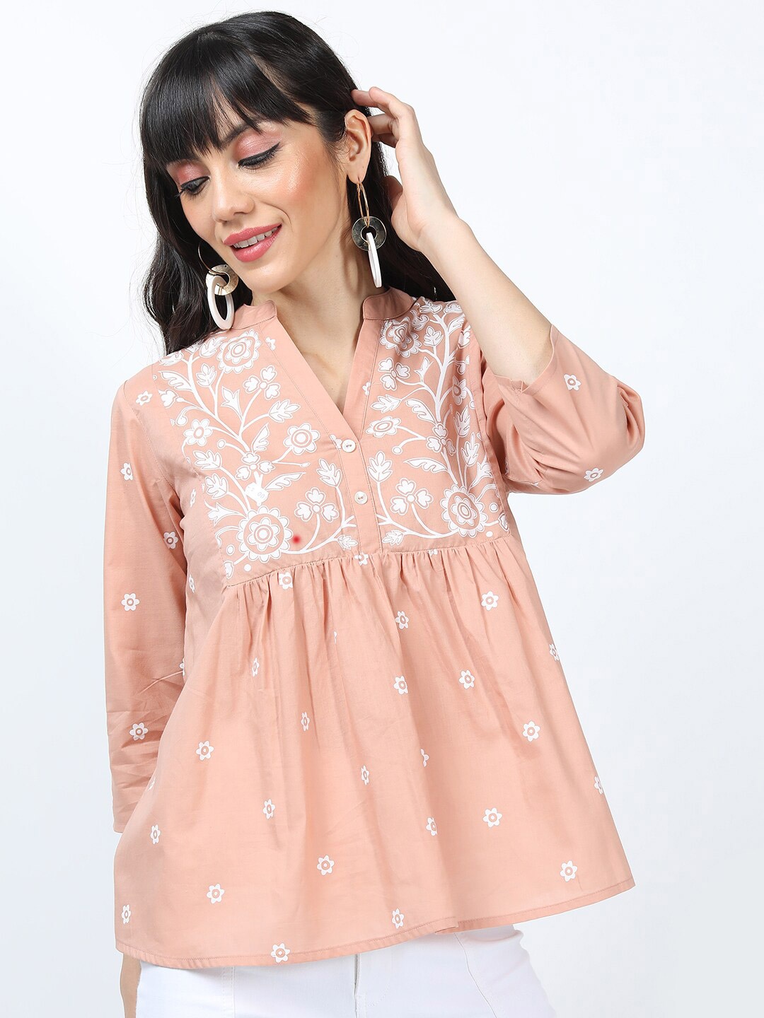 

Vishudh Beige Embroidered Empire Top