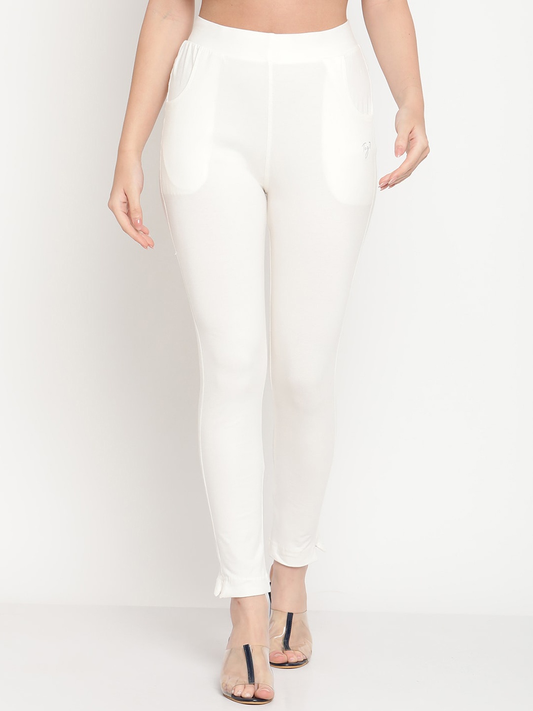 

TAG 7 Women Off-White Solid Ankle-Length Leggings