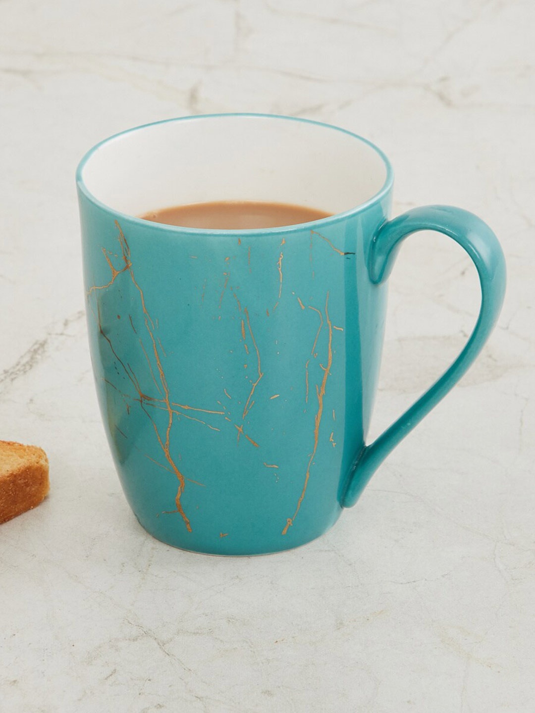 

Home Centre Teal Blue Solid Bone China Glossy Mug