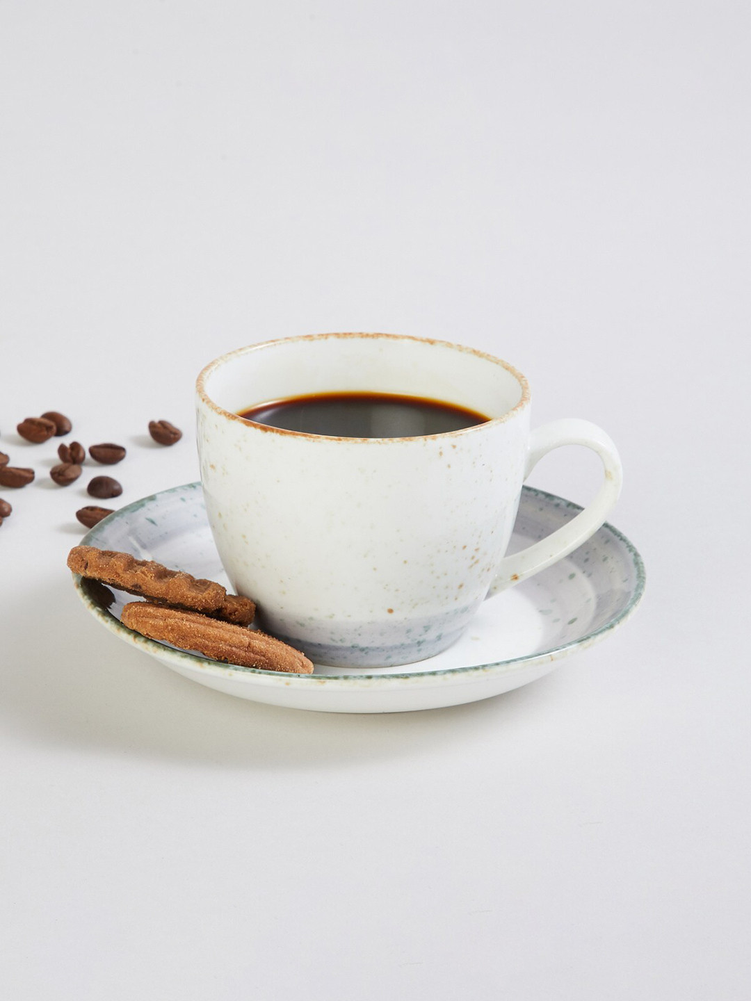 

Home Centre White Solid Bone China Glossy Cups and Saucers Set of Cups and Mugs