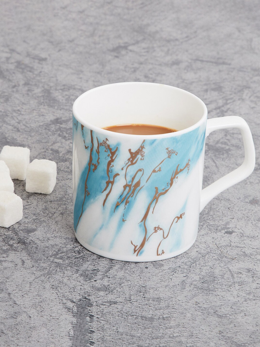 

Home Centre White & Blue Printed Bone China Glossy Mug 350ml