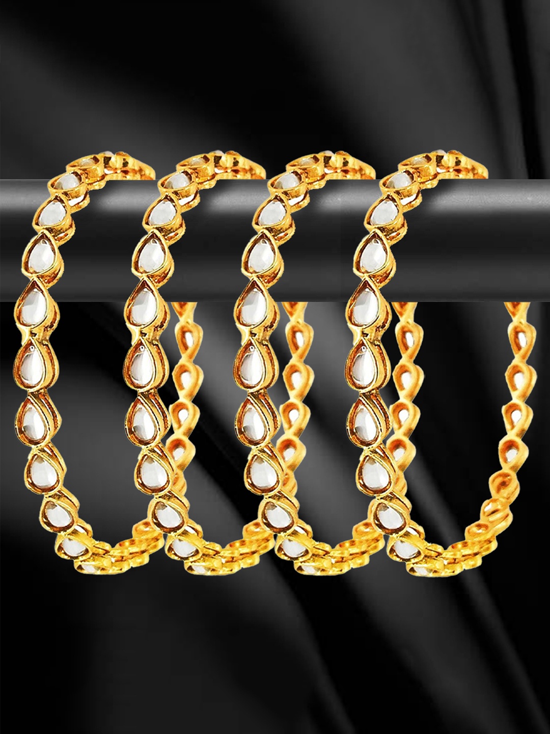 

YouBella Set of 4 Gold-Plated & White Kundan-Studded Bangles