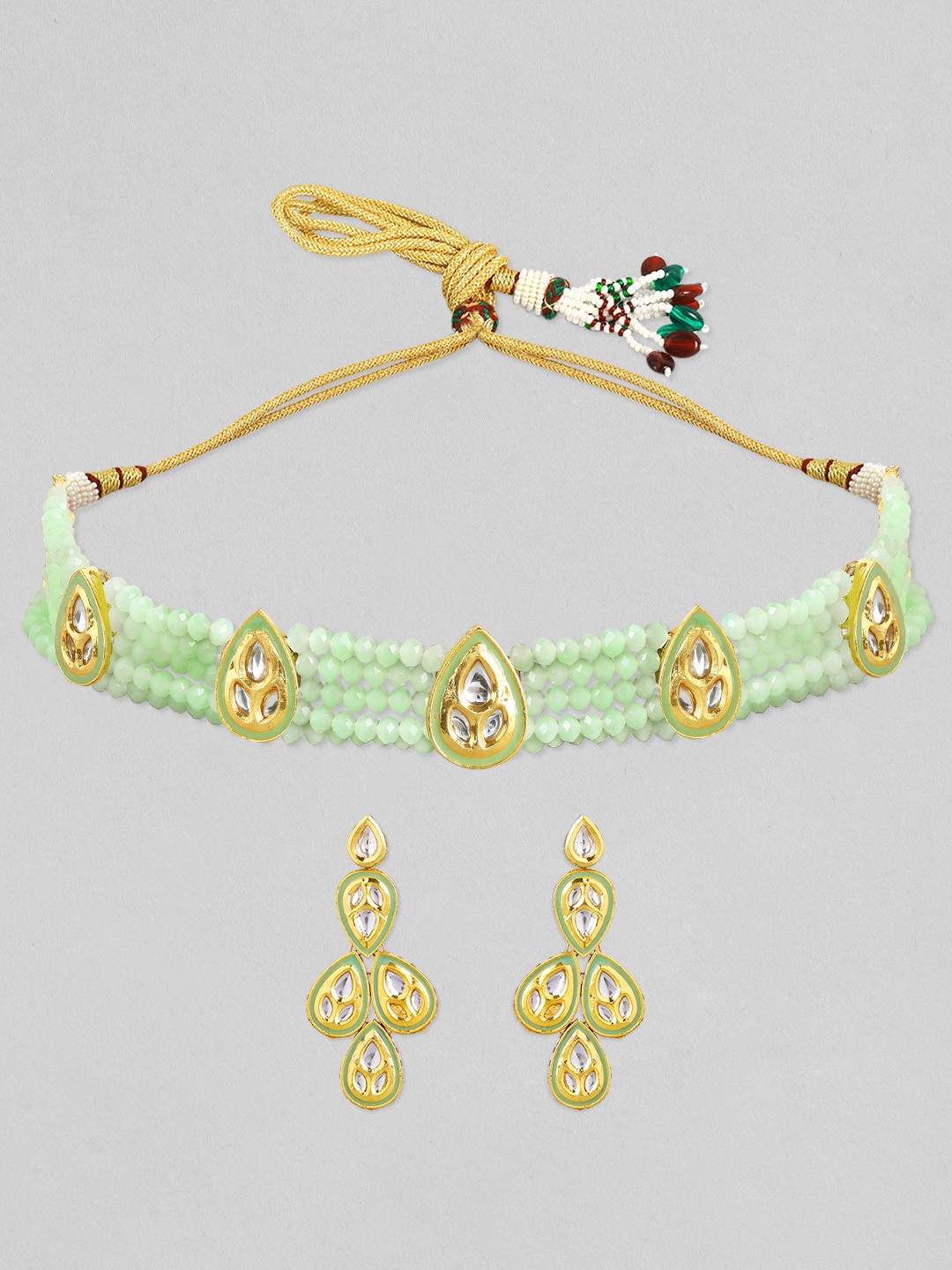 

Anouk Gold-Plated Green Kundan Studded Jewellery Set