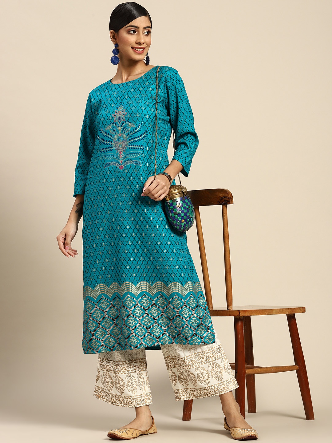 

Sangria Women Turquoise Blue Ethnic Motifs Printed Kurta with Palazzos