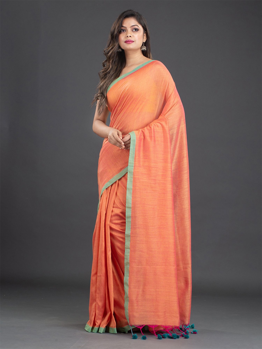 

Arhi Orange & Green Solid HandwovenPure Cotton Saree