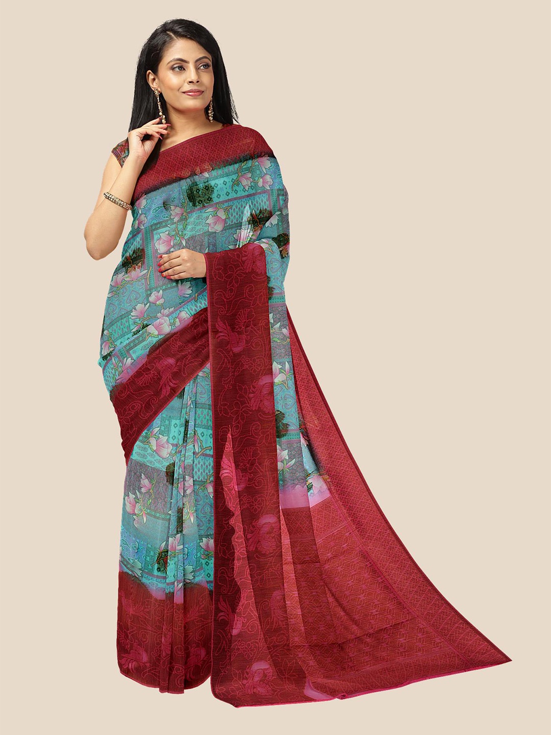 

Kalamandir Blue & Magenta Floral Jute Silk Saree