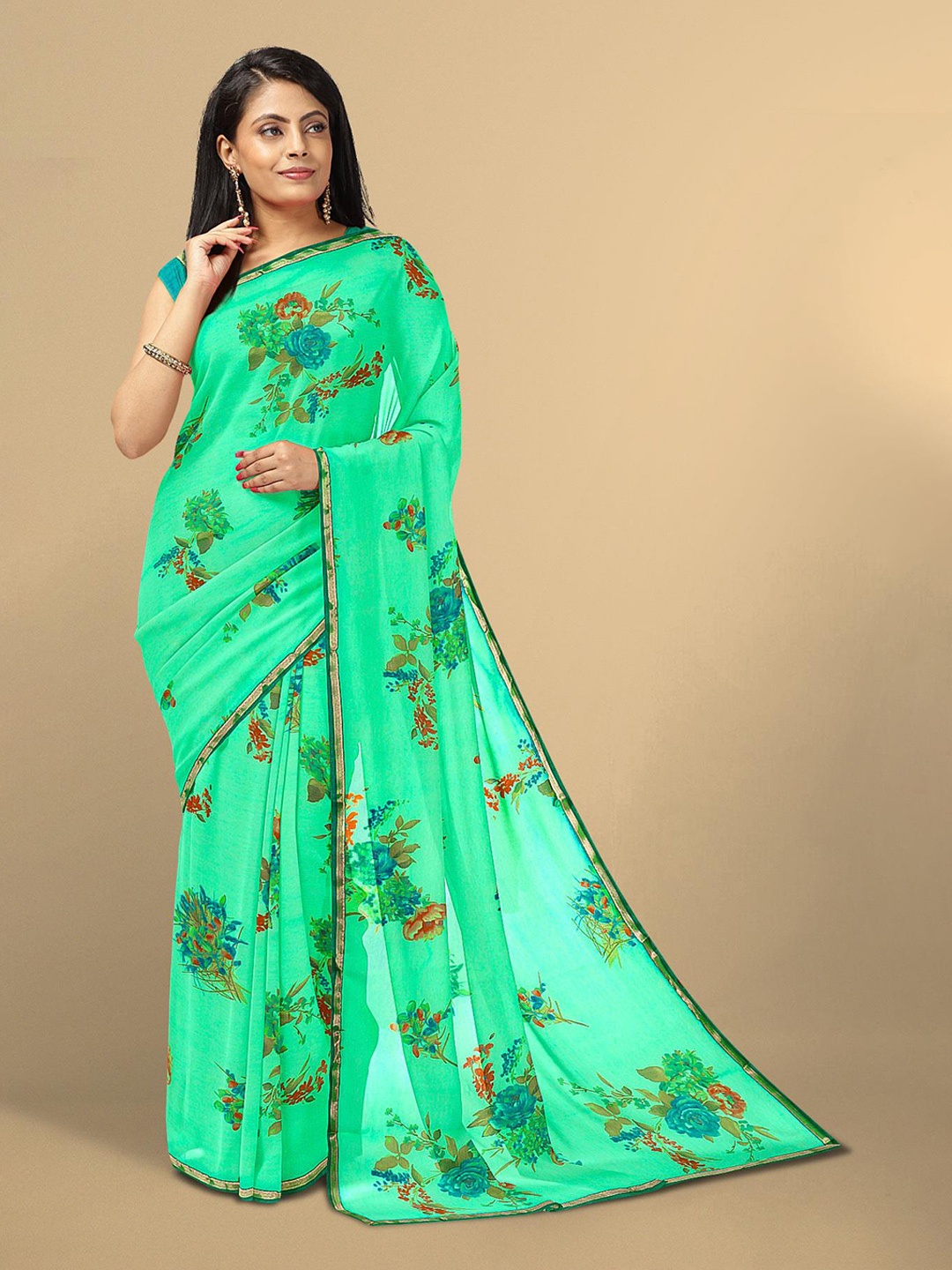 

Kalamandir Green Floral Zari Pure Georgette Saree
