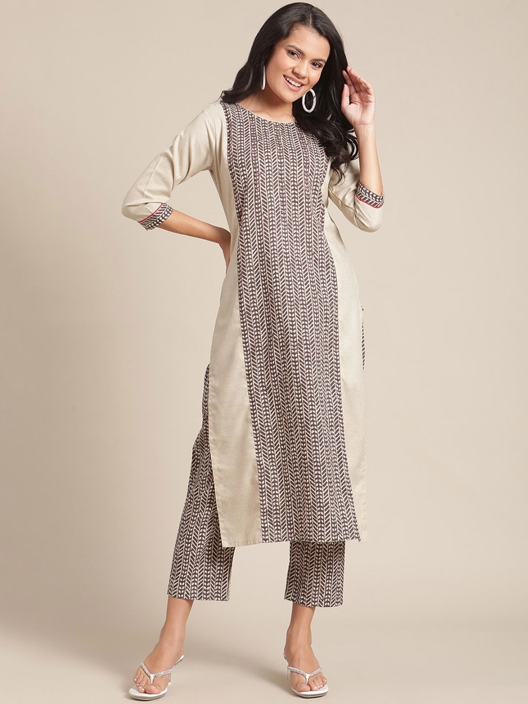 

KSUT Women Cream-Coloured Printed Panelled Kurta with Trousers