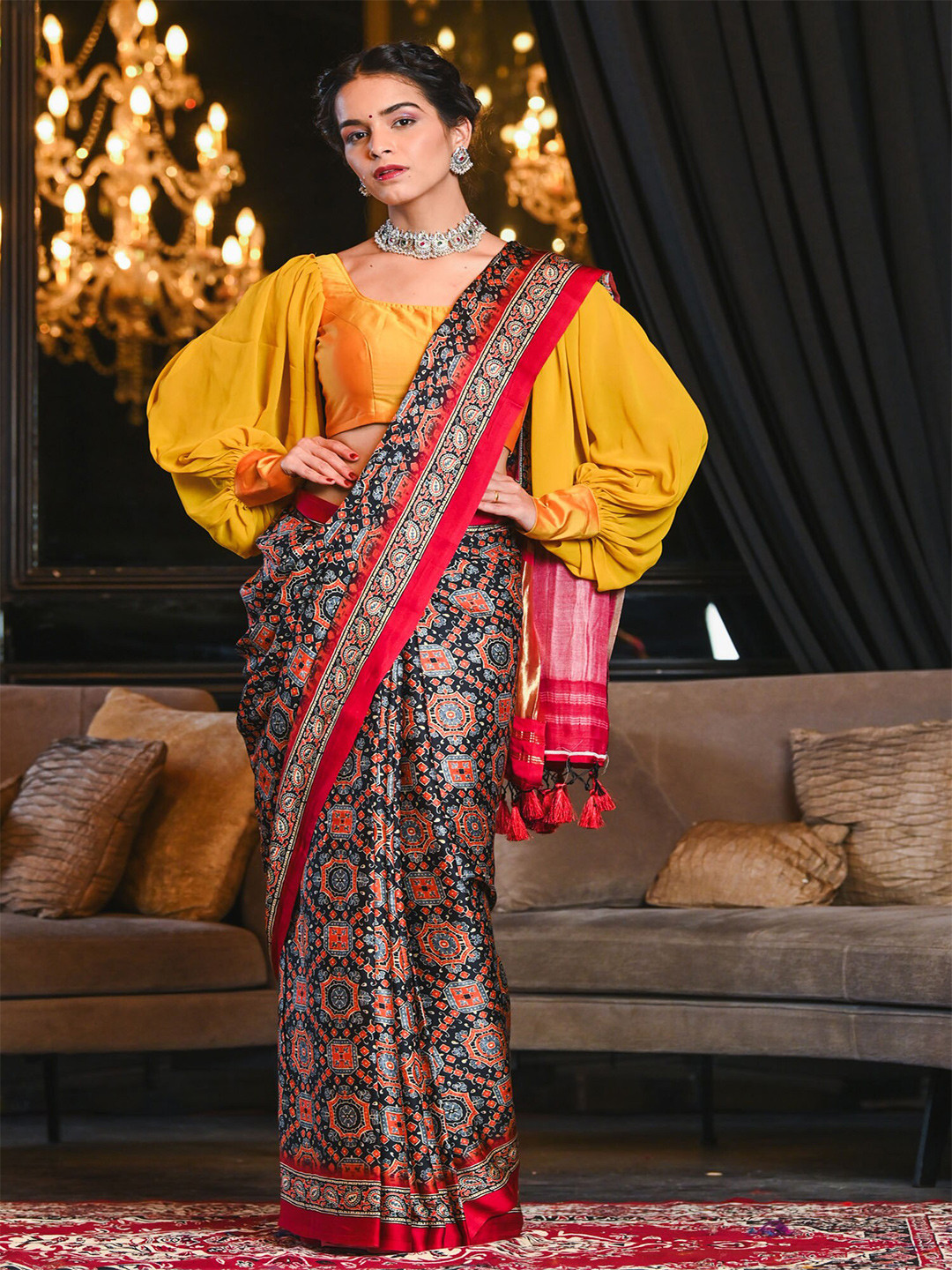 

BEATITUDE Women Red & Black Ajrak Print Zari Border Saree