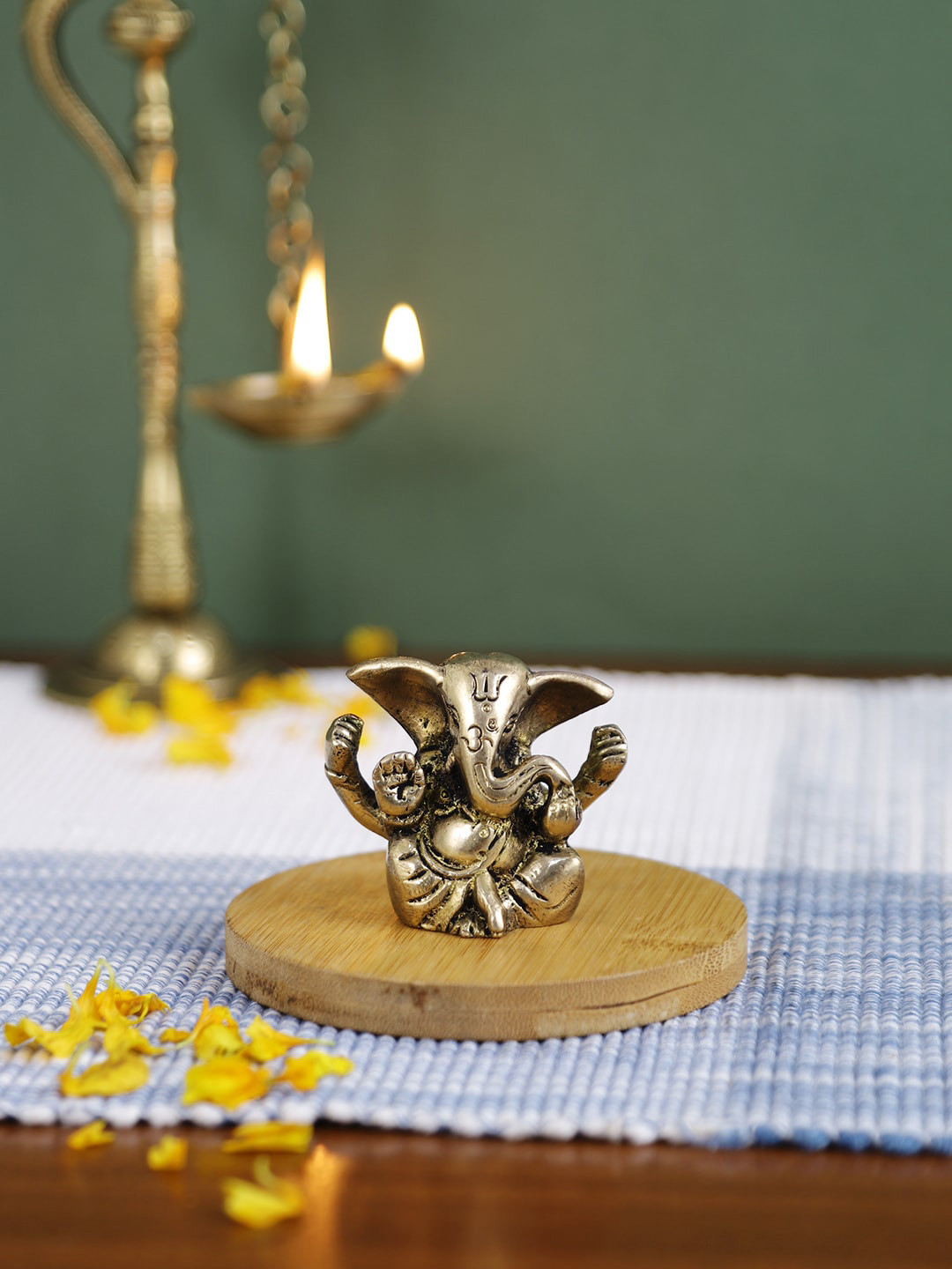 

Imli Street Gold-Toned Brass Ganesha Idol Showpiece