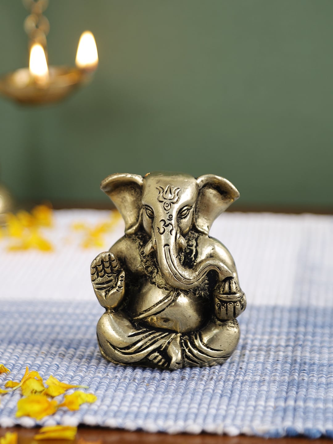 

Imli Street Gold-Toned Ganesh 2 Hands Showpiece
