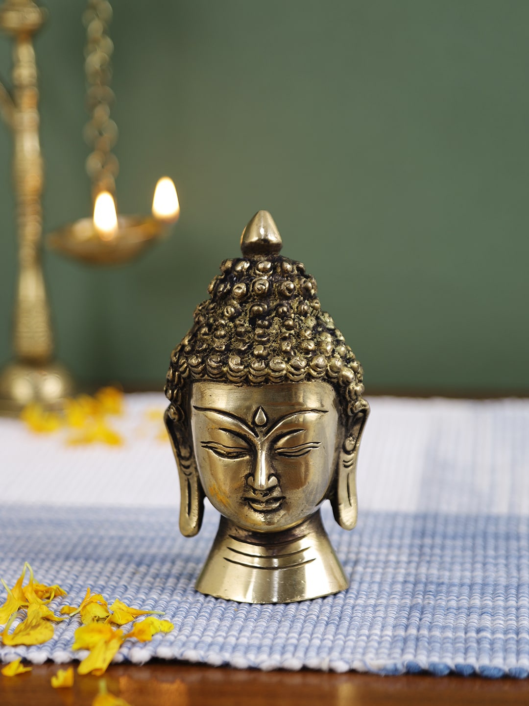 

Imli Street Gold-Toned & Textured Buddha Small Round Base Showpiece