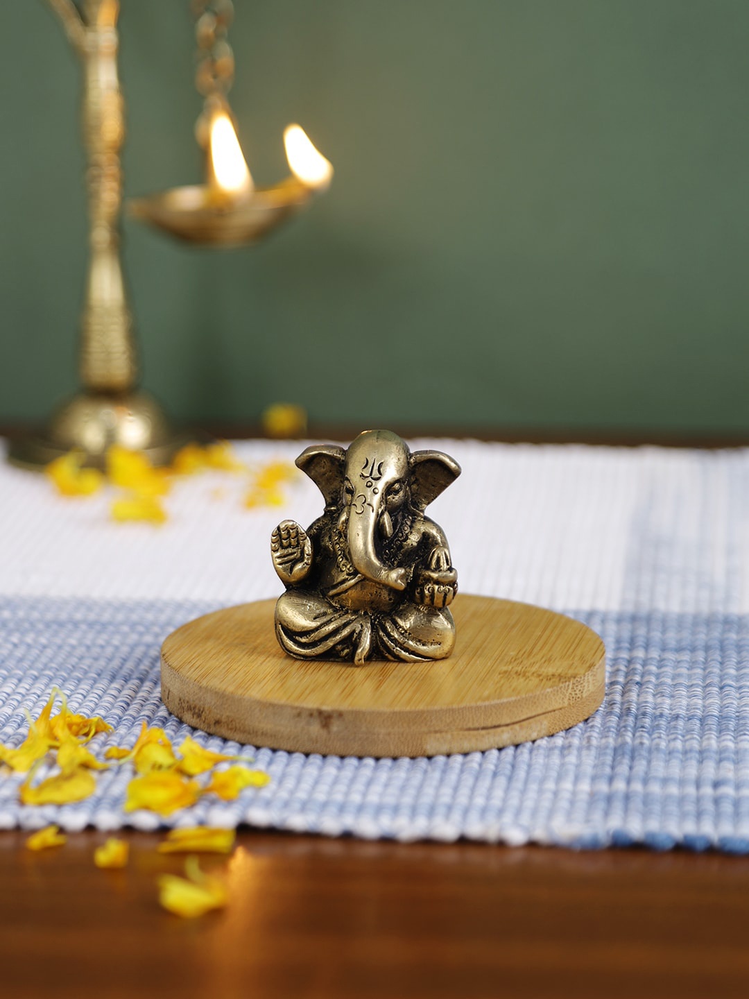 

Imli Street Gold-Colored Ganesh Showpieces