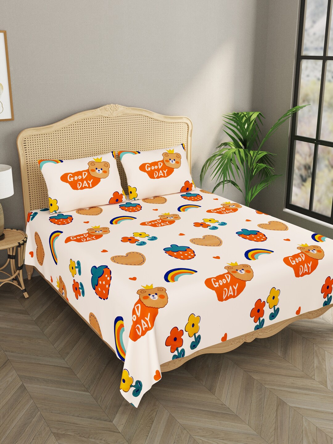 

Gulaab Jaipur White & Orange Cartoon Characters 210 TC King Bedsheet with 2 Pillow Covers