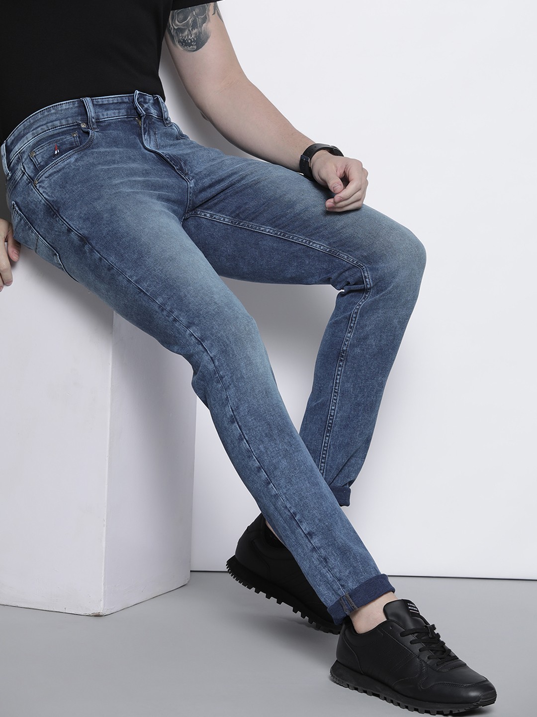 

Nautica Men Blue Slim Fit Mid-Rise Heavy Fade Stretchable Jeans