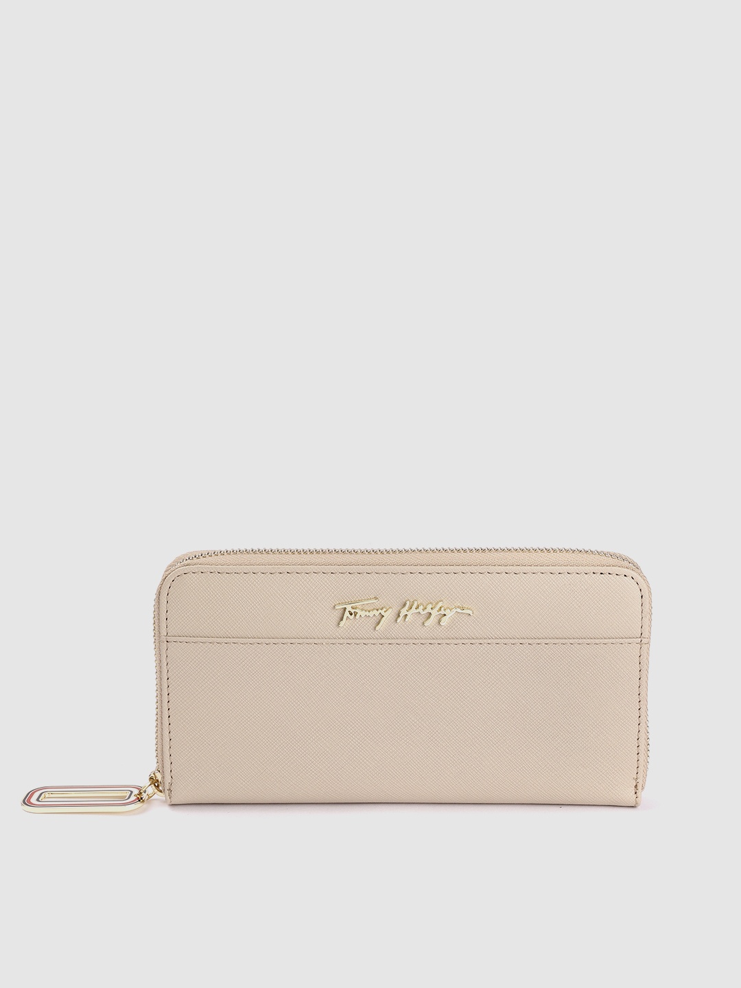 

Tommy Hilfiger Women Bran Logo Embellished Leather Zip Around Wallet, Beige