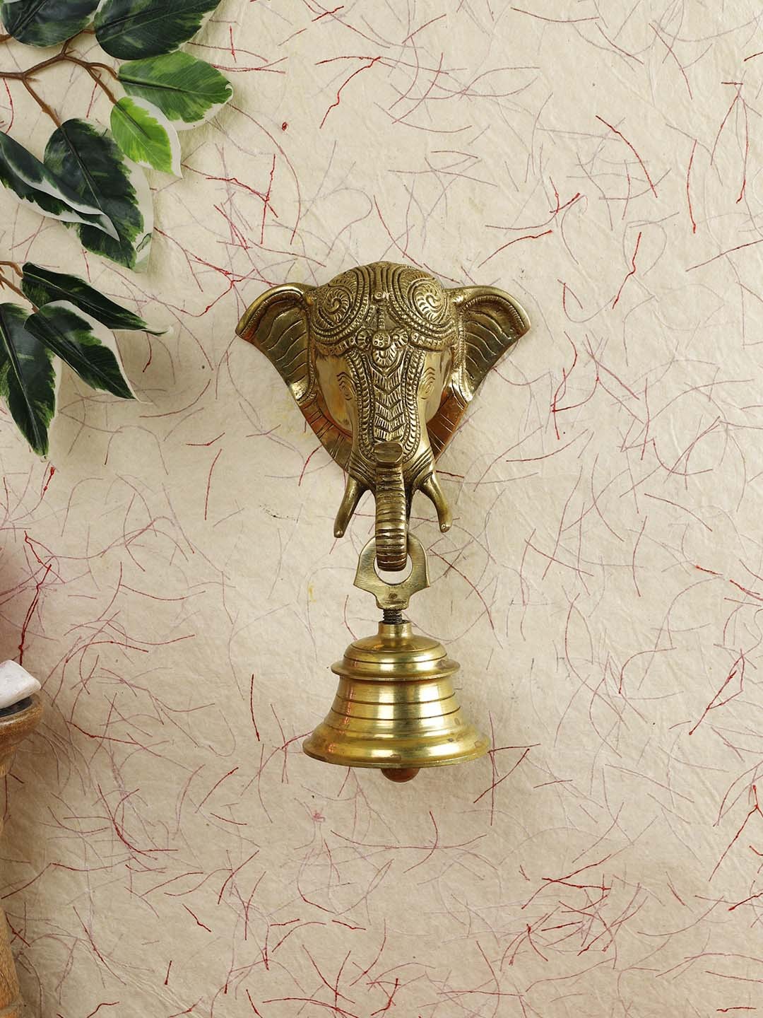 

Imli Street Gold-Toned Elephant Face Shaped Wall Hanging Bell Showpieces
