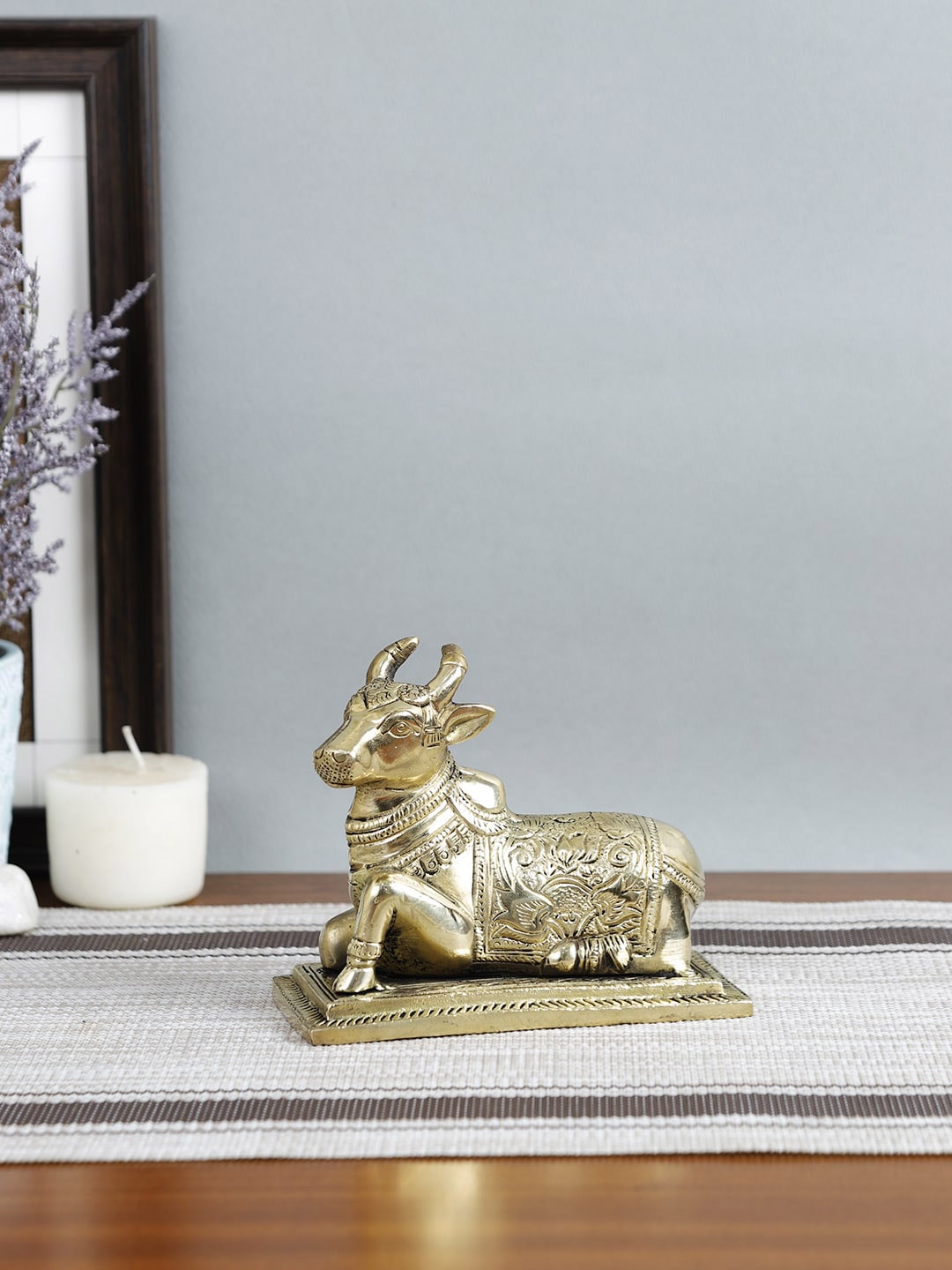 

Imli Street Gold-Toned Nandi Table Top Accent Showpieces