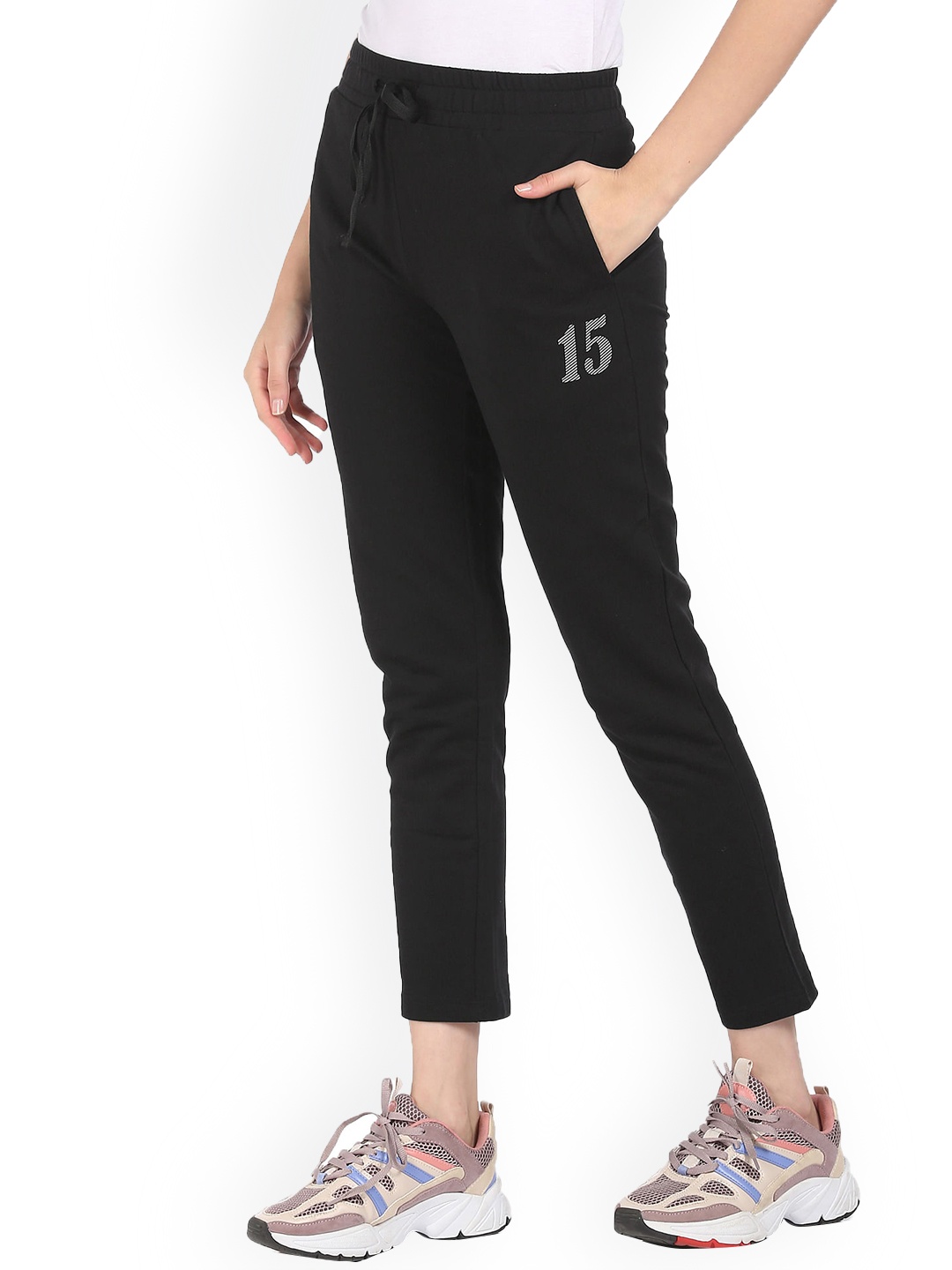 

Sugr Women Black Solid Track Pants