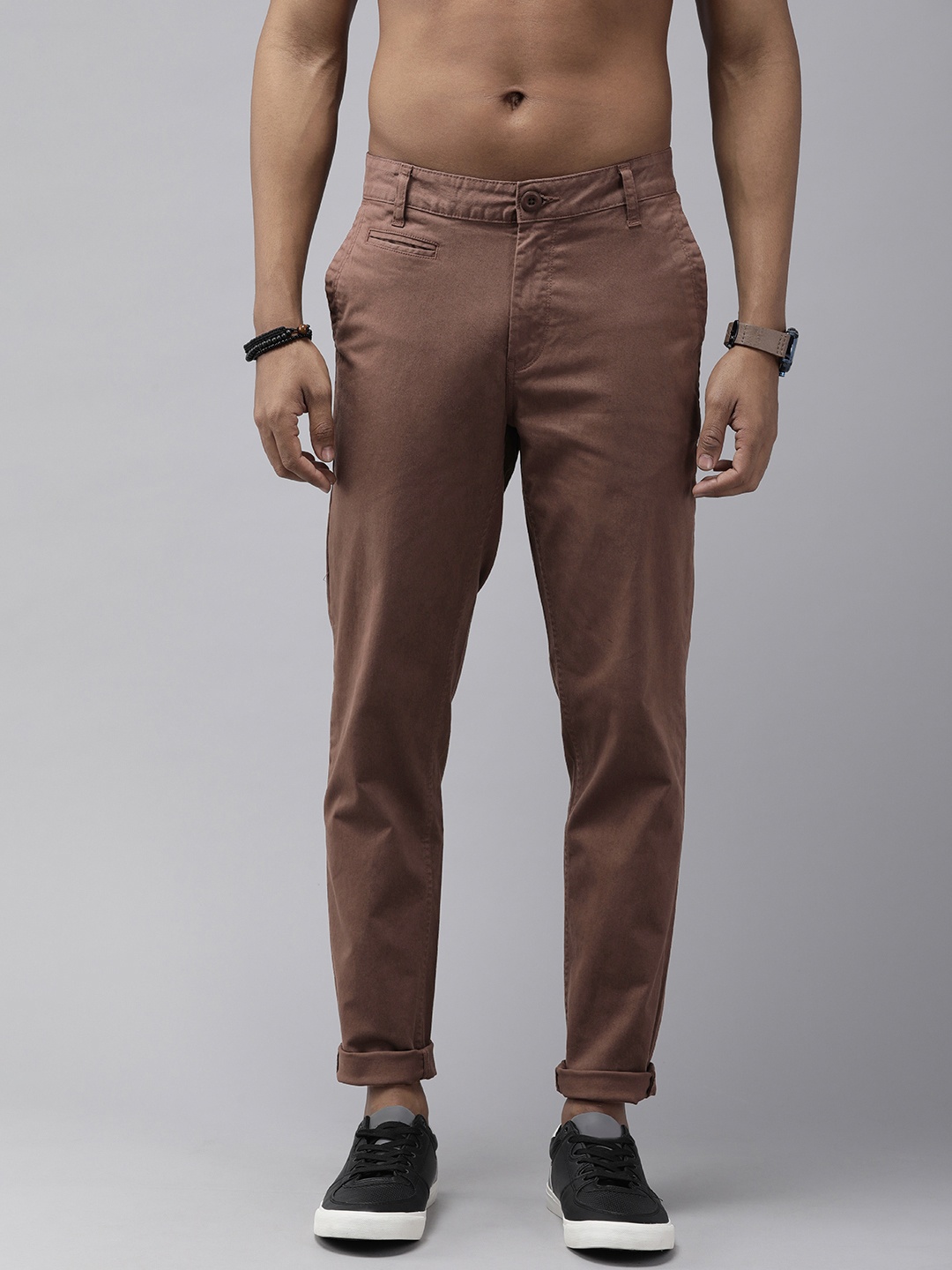 

Roadster Men Brown Solid Tapered Fit Regular Trousers