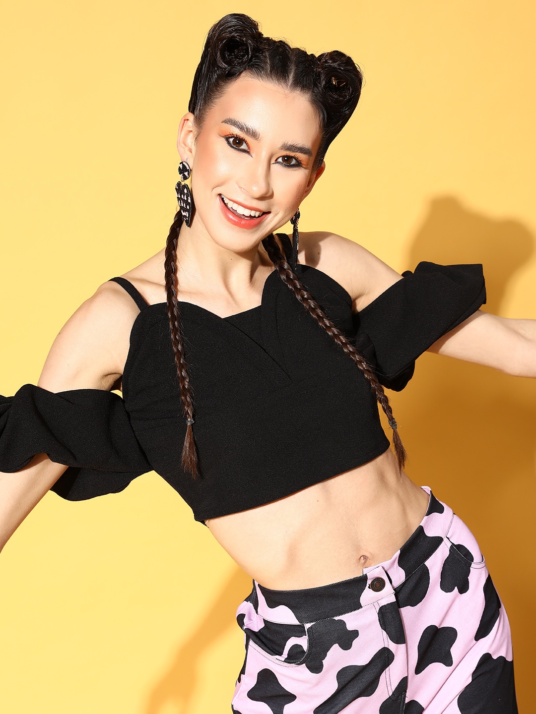 

Athena Women Stylish Black Solid Volume Play Top