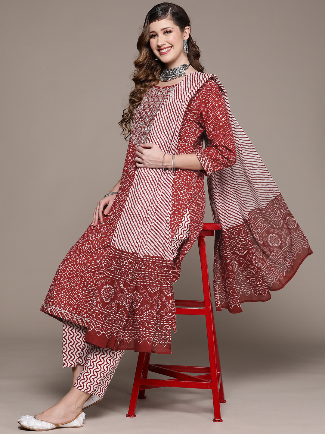

Ishin Women Maroon Bandhani Printed Mirror Work Pure Cotton Kurta with Trousers & Dupatta