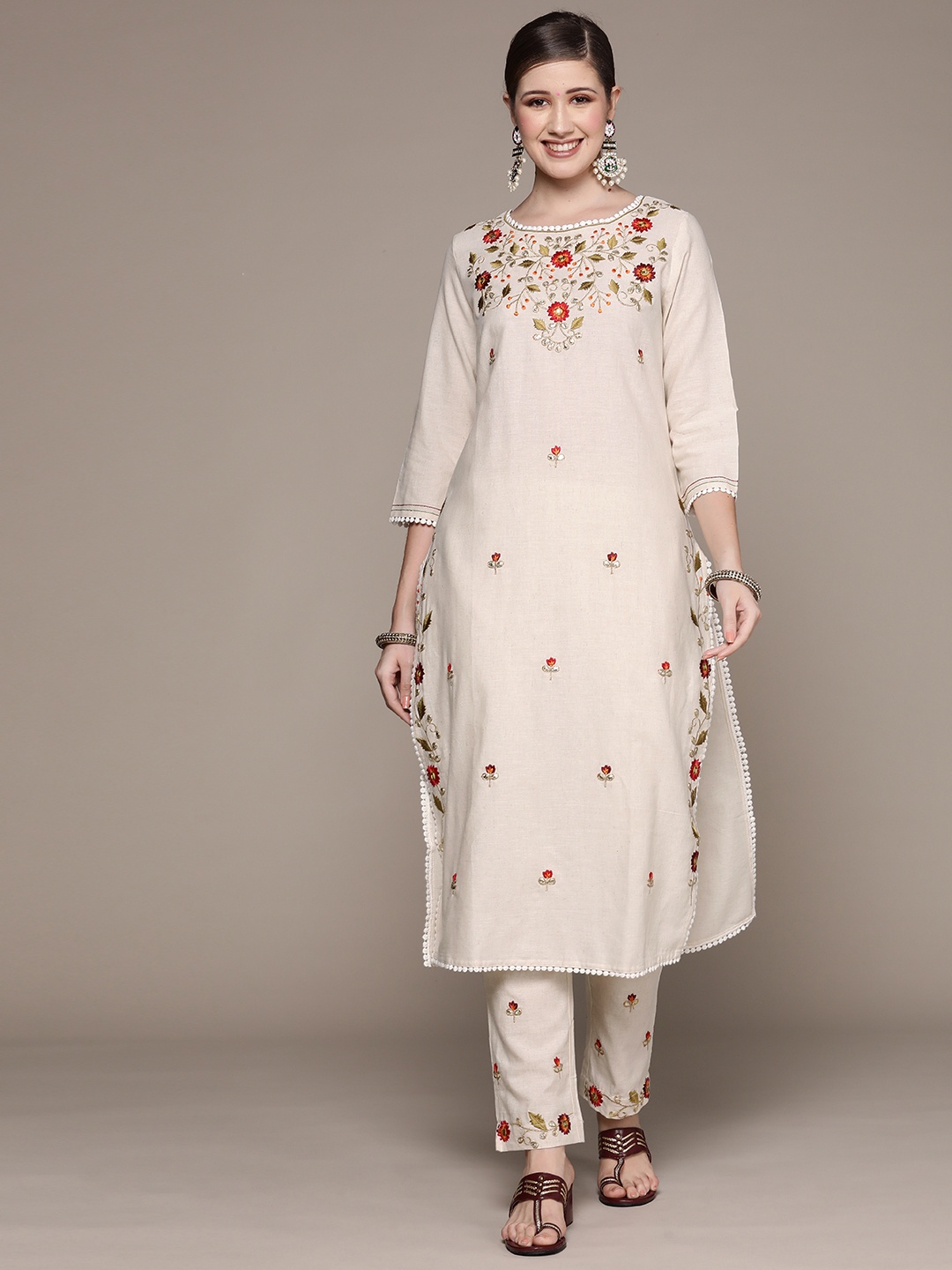 

Ishin Women Off White Ethnic Motifs Embroidered Mirror Work Pure Cotton Kurta with Trousers
