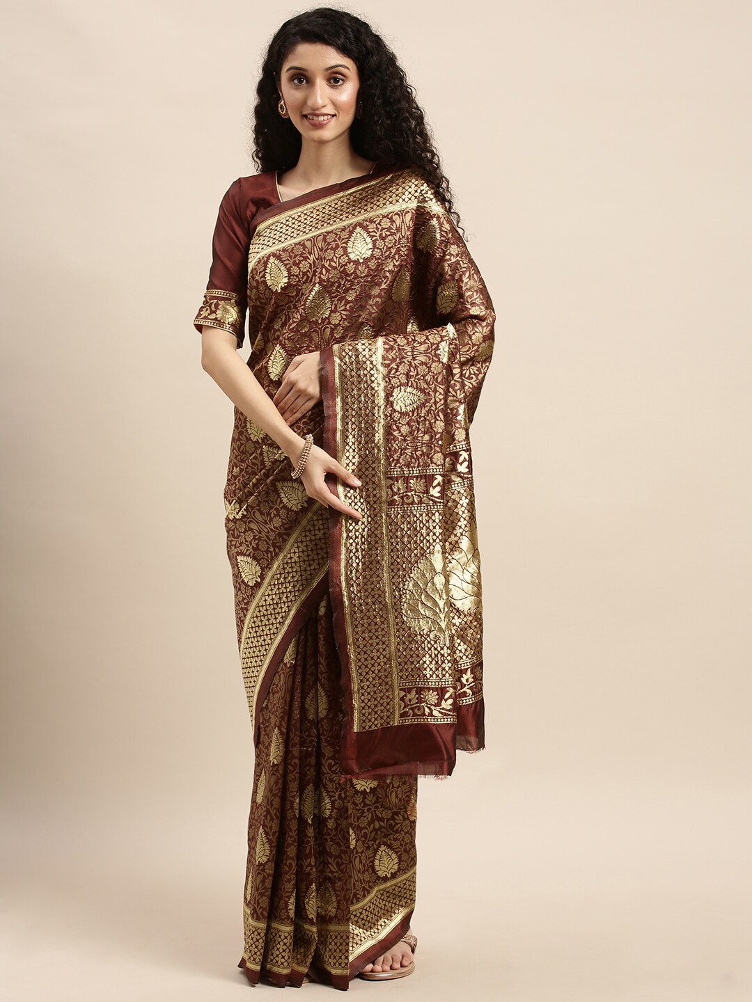 

Mitera Maroon & Golden Ethnic Motifs Zari Silk Blend Banarasi Saree