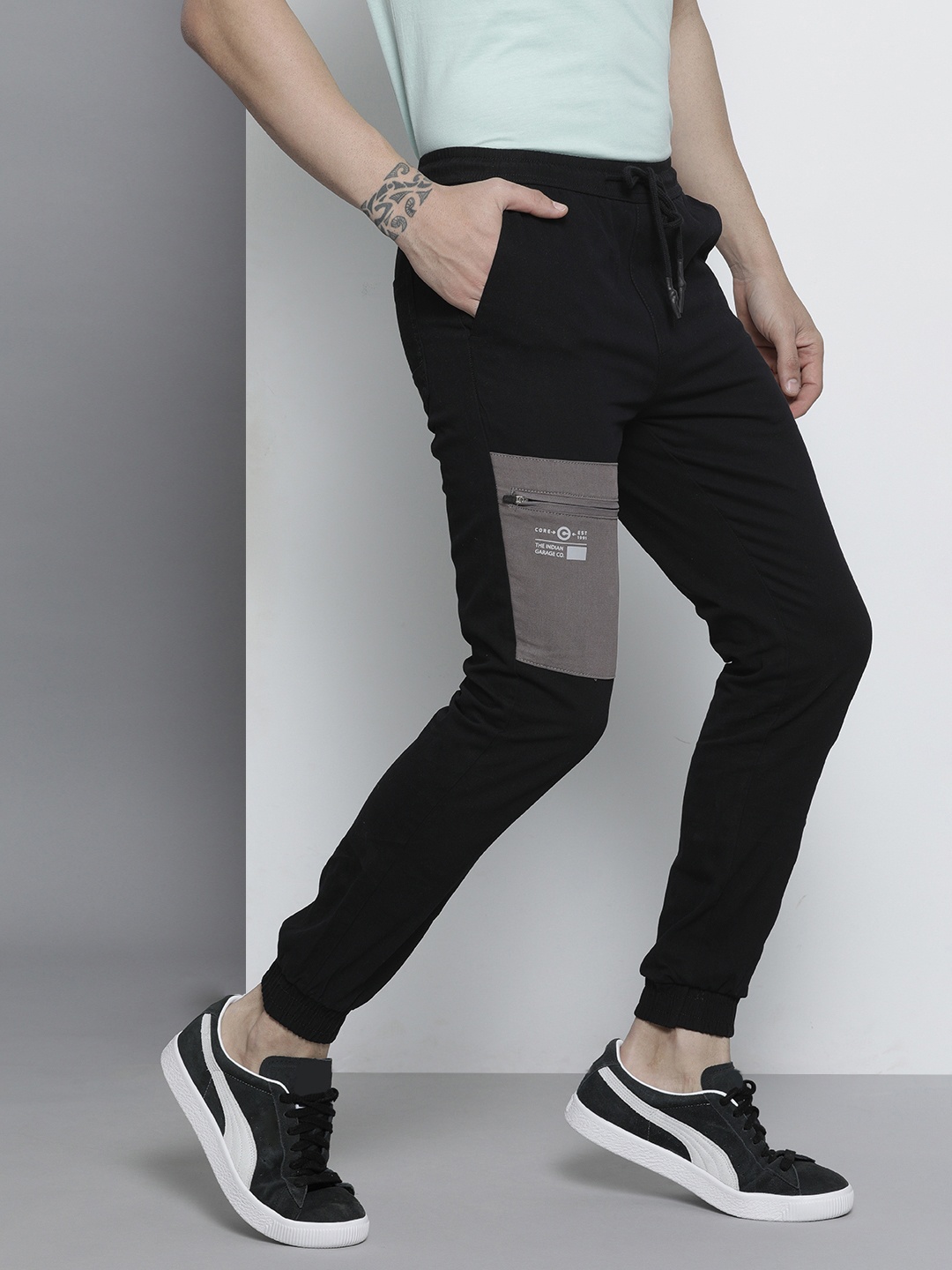 

The Indian Garage Co Men Black Printed Joggers Trousers