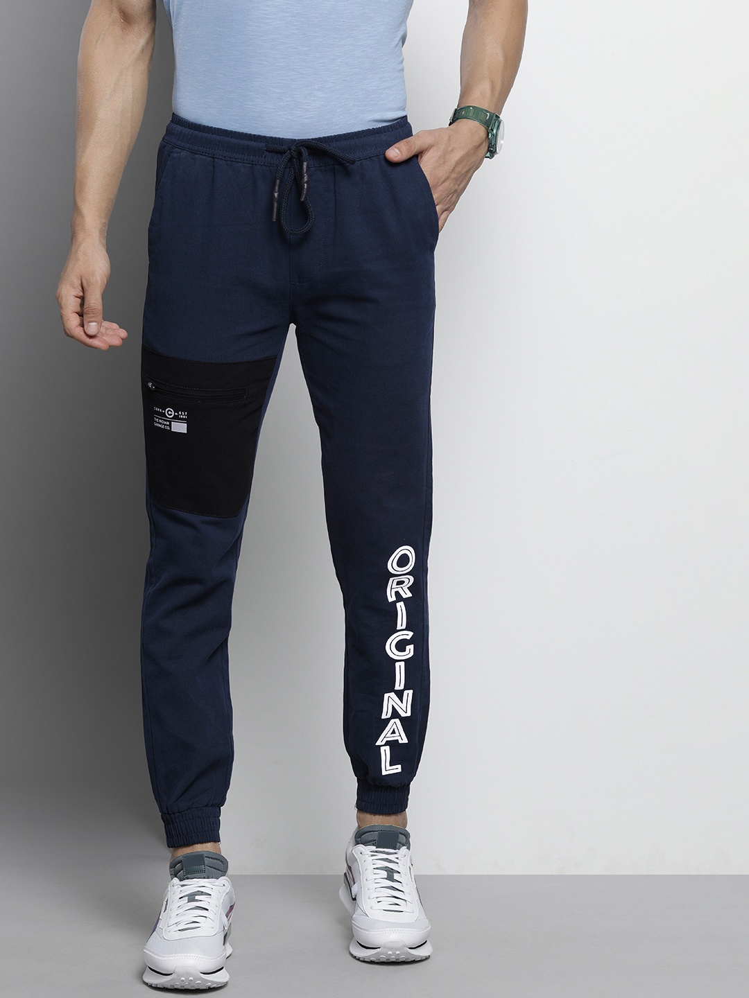 

The Indian Garage Co Men Navy Blue Colourblocked Slim Fit Pleated Joggers Trousers