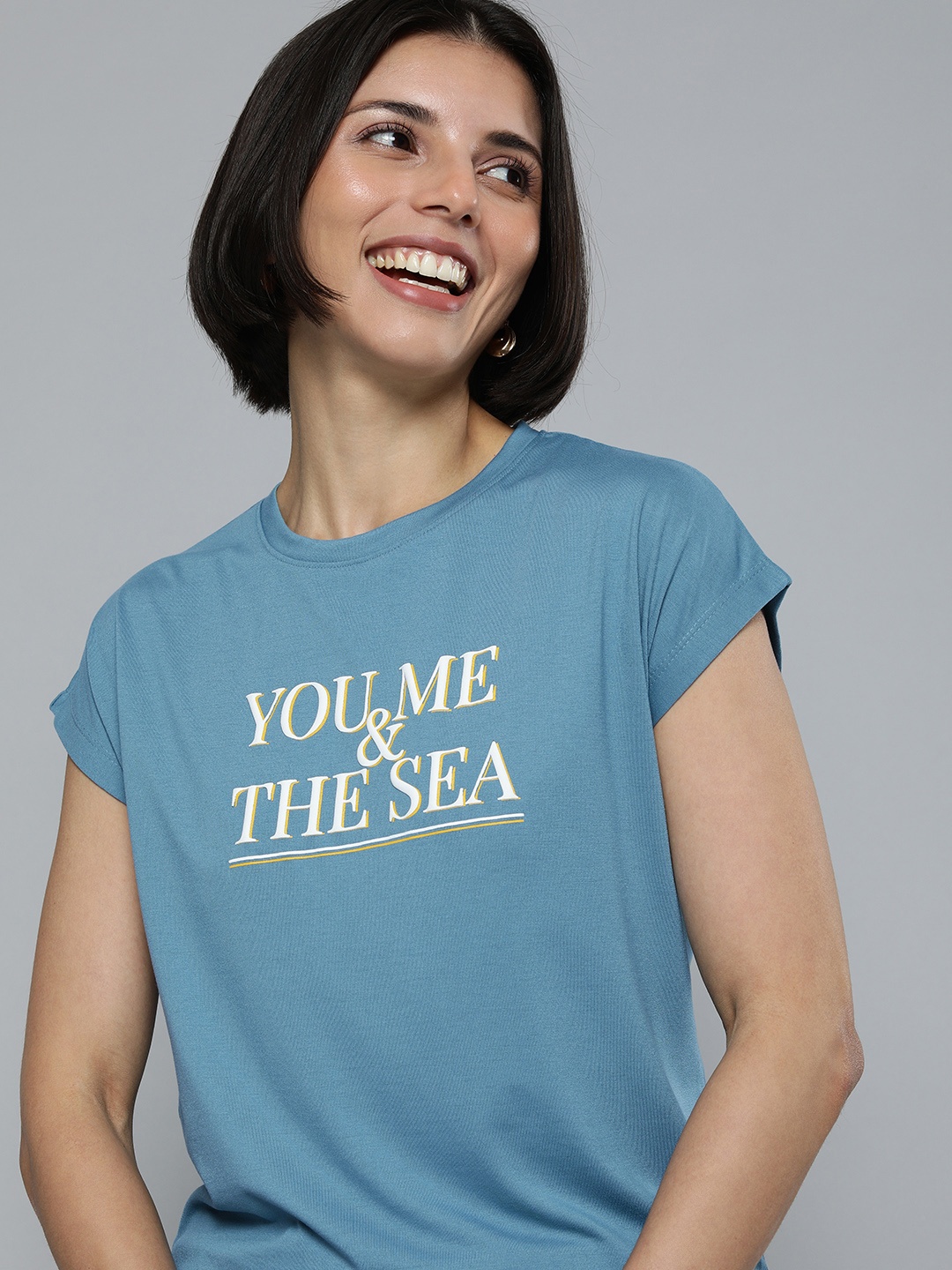 

Mast & Harbour Women Blue Typography Printed Extended Sleeves T-shirt