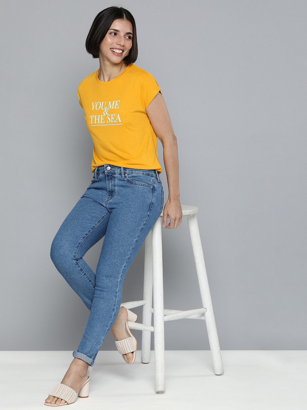 

Mast & Harbour Women Mustard Yellow Typography Printed Extended Sleeves T-shirt