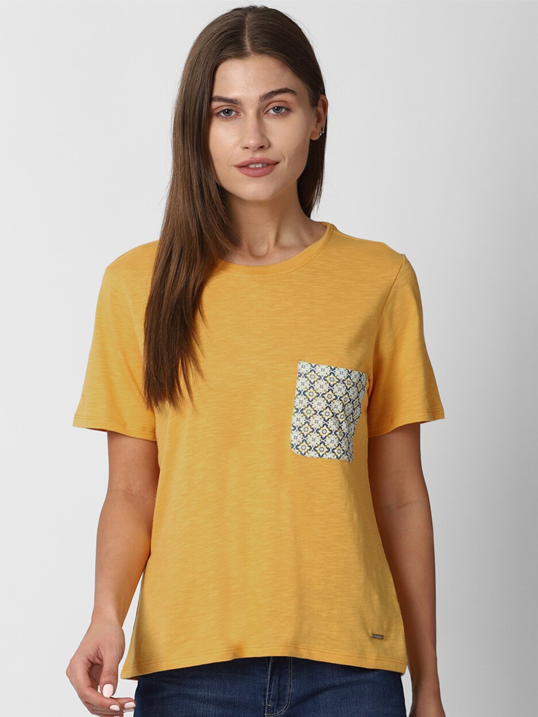 

Van Heusen Woman Yellow Solid Round Neck Regular Top