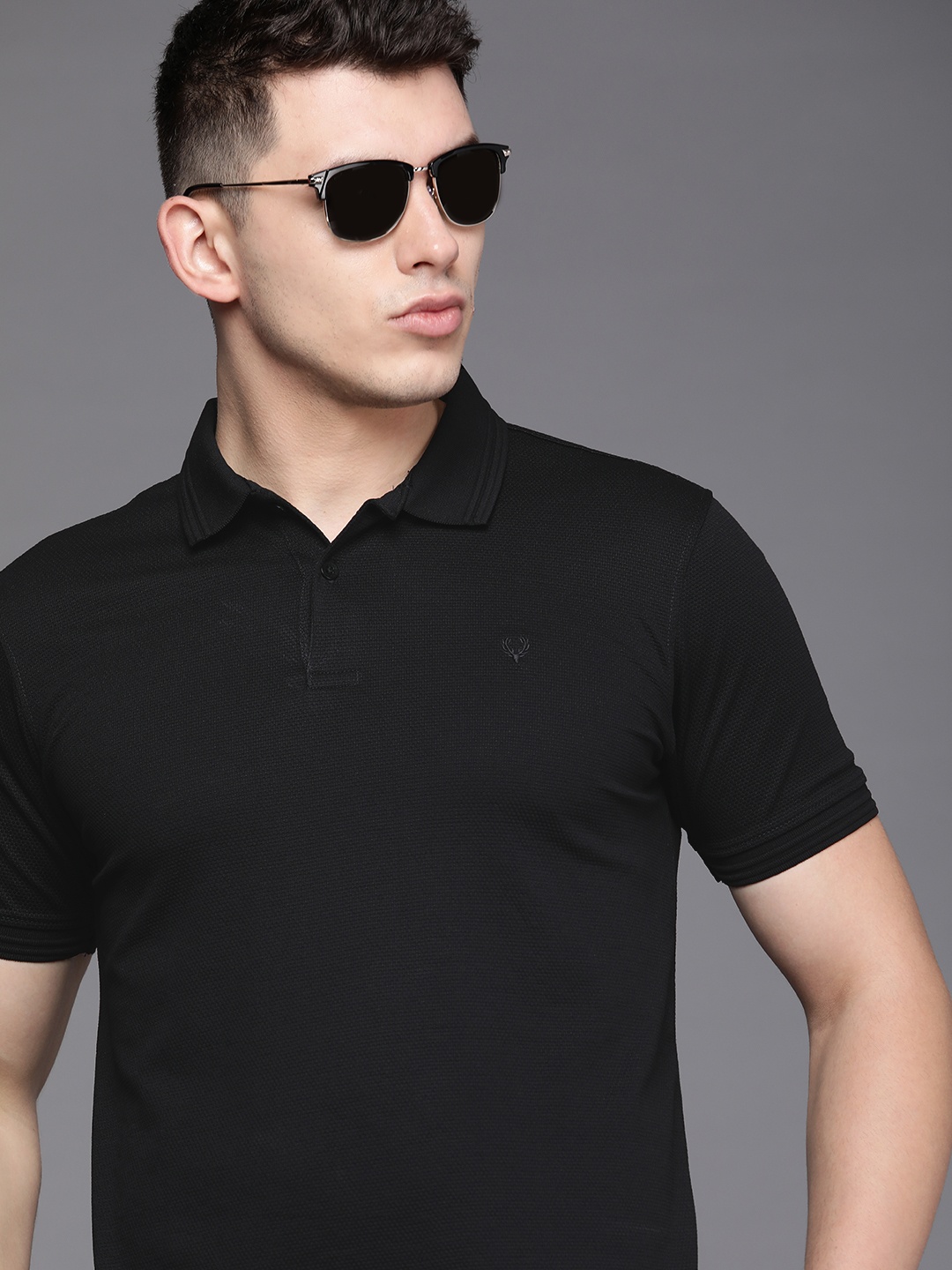 

Allen Solly Men Black Self Design Polo Collar Casual T-shirt